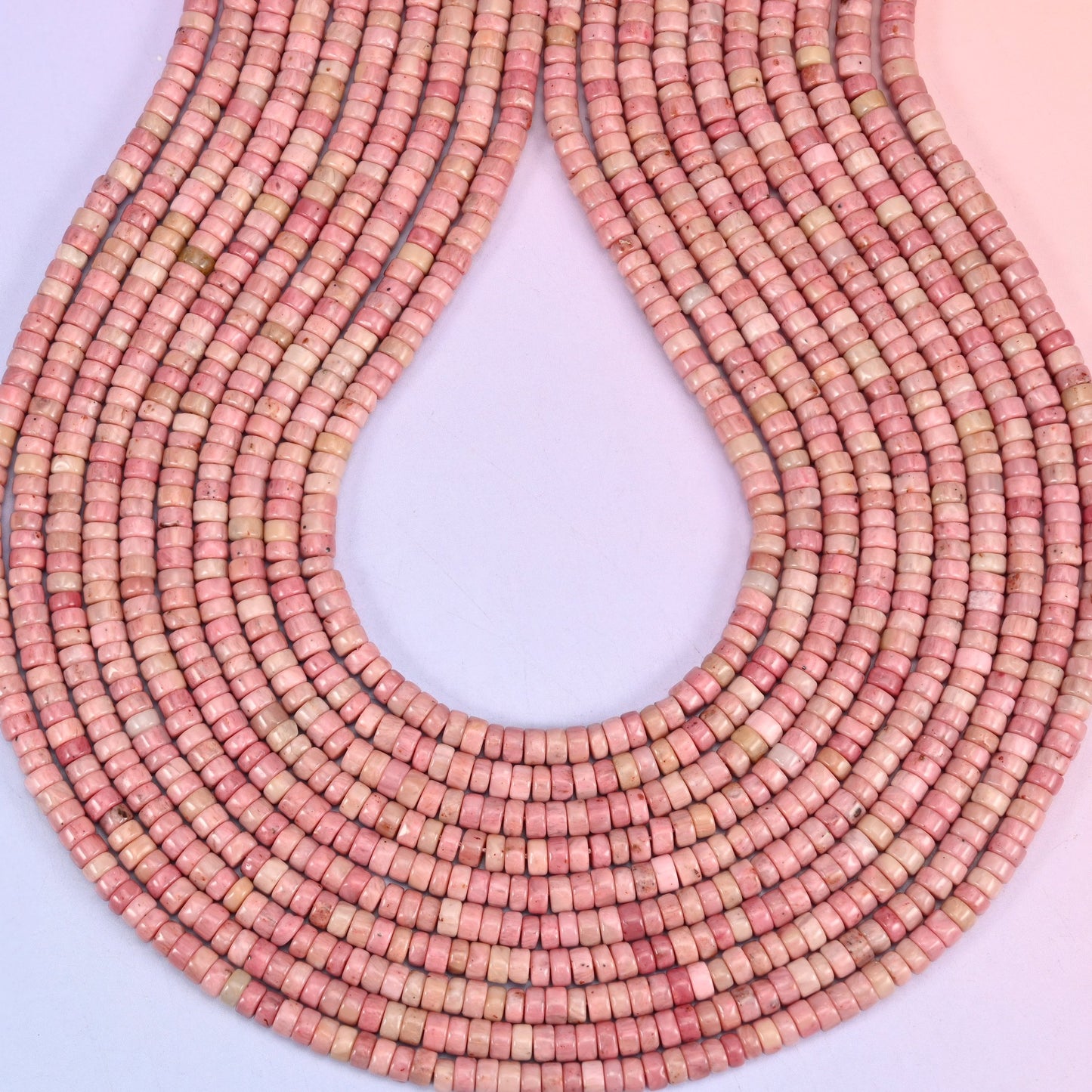 Pink Rhodonite heishi beads, center-drilled 1.0mm hole.