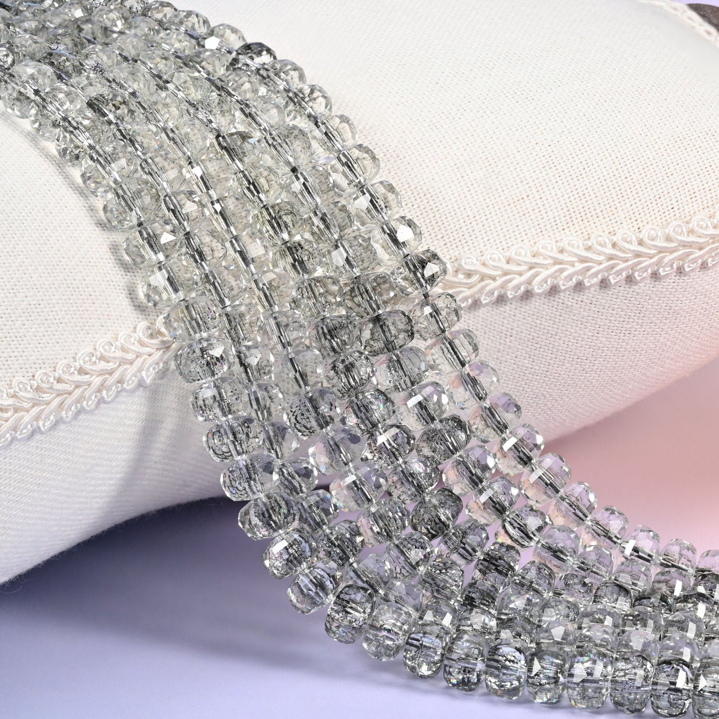 Transparent black faceted rondelle glass beads, smoke-tinted and charcoal in the mass