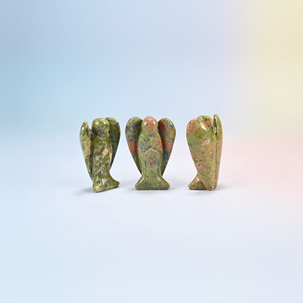 Three natural unakite guardian angel carvings, green and salmon pink, 2 inch