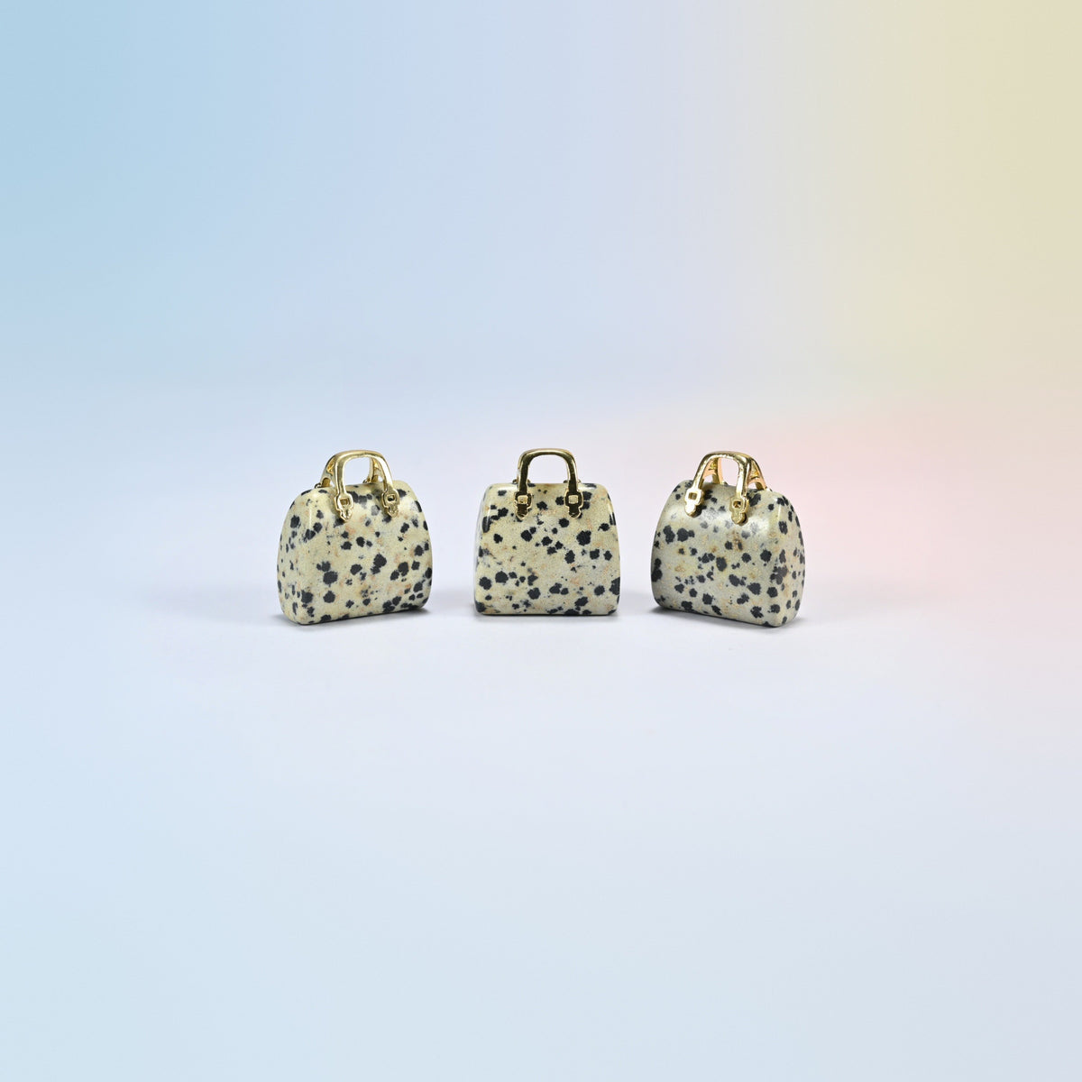 Three dalmatian jasper purse crystal carvings, 1 inch, cream natural stone with black spots, gold-tone handle