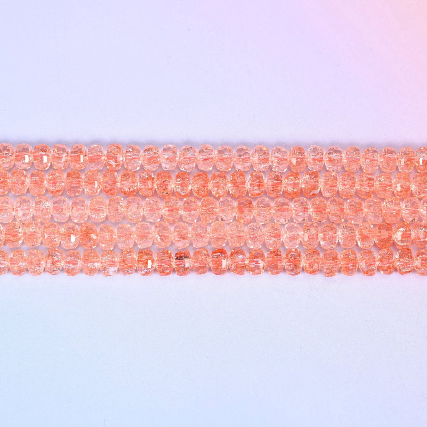 Transparent Orange Faceted Rondelle Glass Beads in soft peachy coral