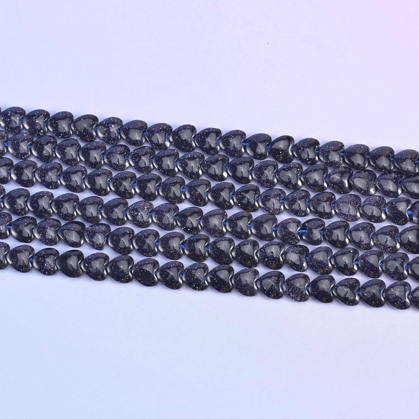 Blue Sandstone Heart Beads 6mm in deep midnight blue with dense copper glitter flecks