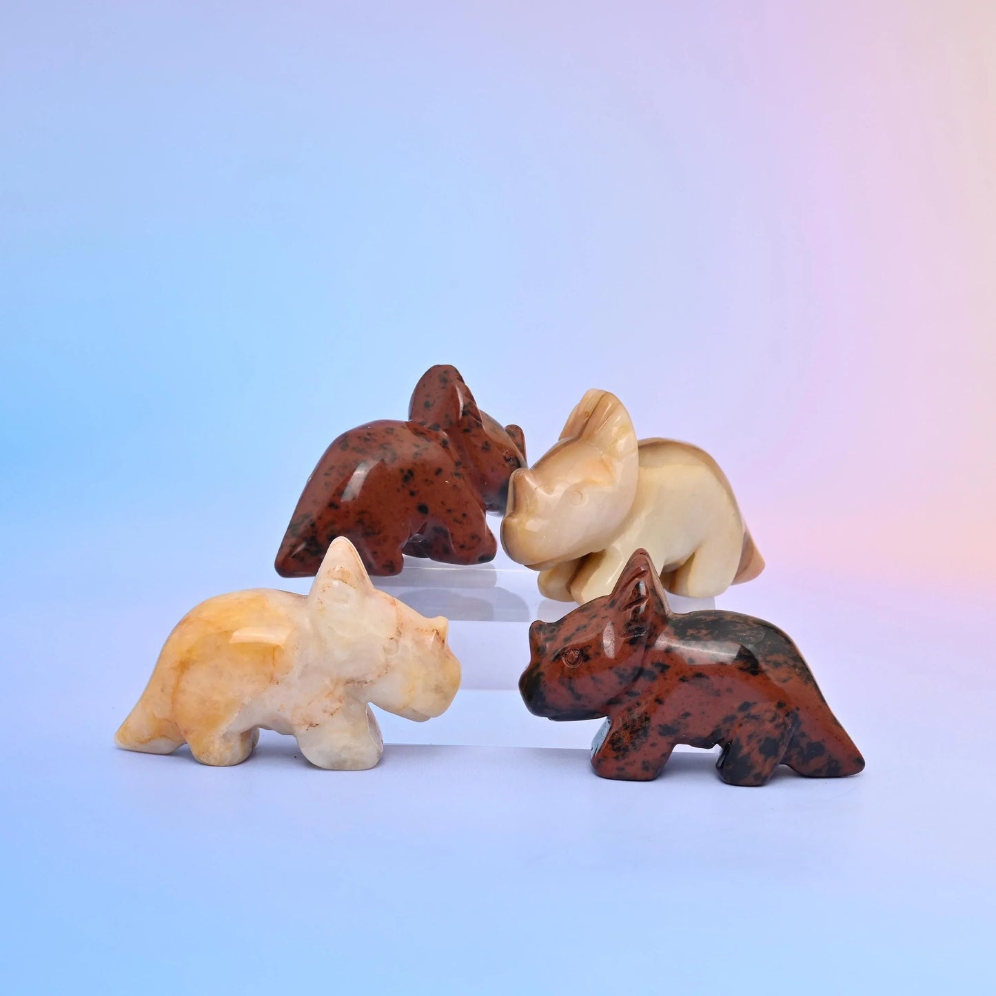 Triceratops dinosaur crystal carving, approximately 1.2 oz