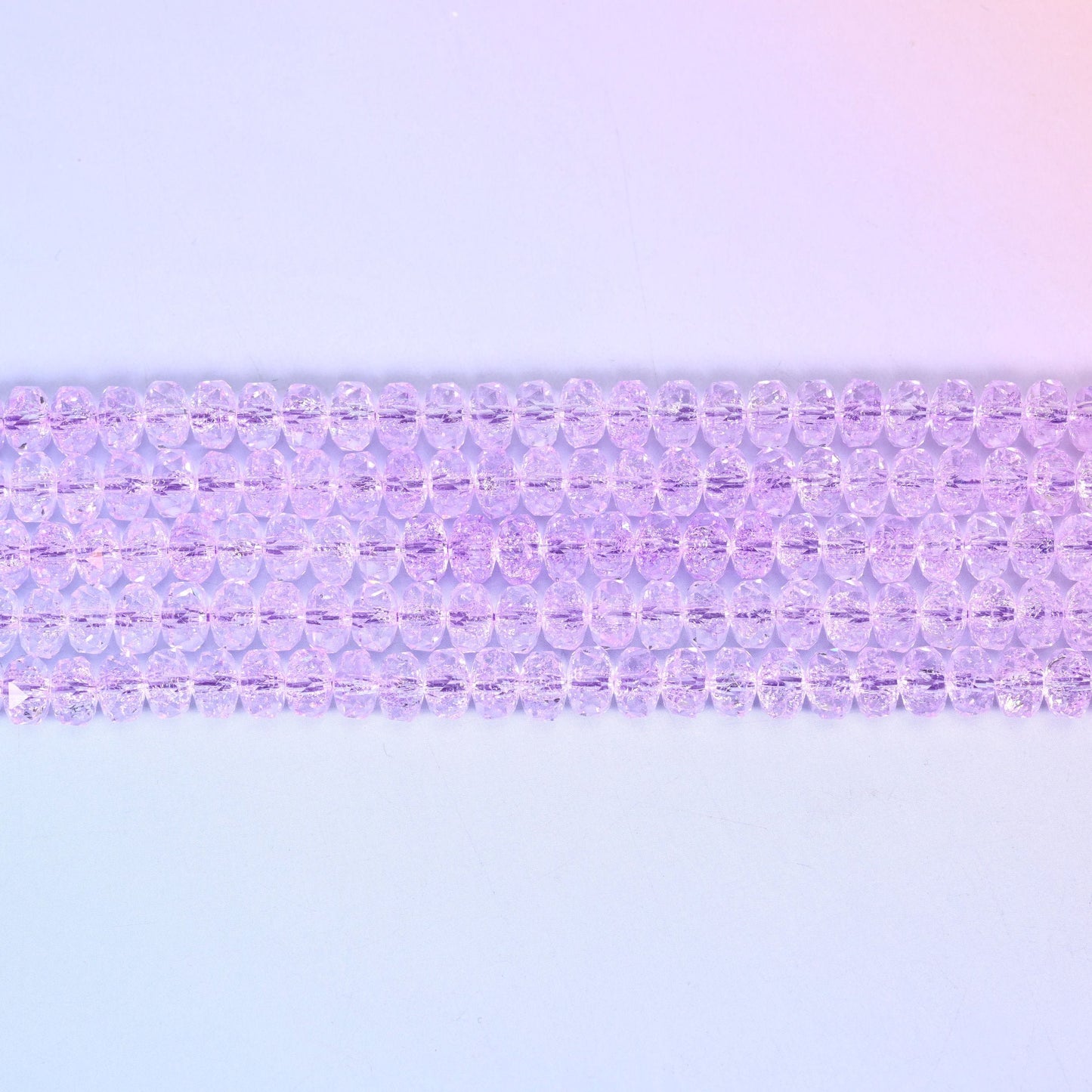Transparent Purple Faceted Rondelle Glass Beads in pale violet