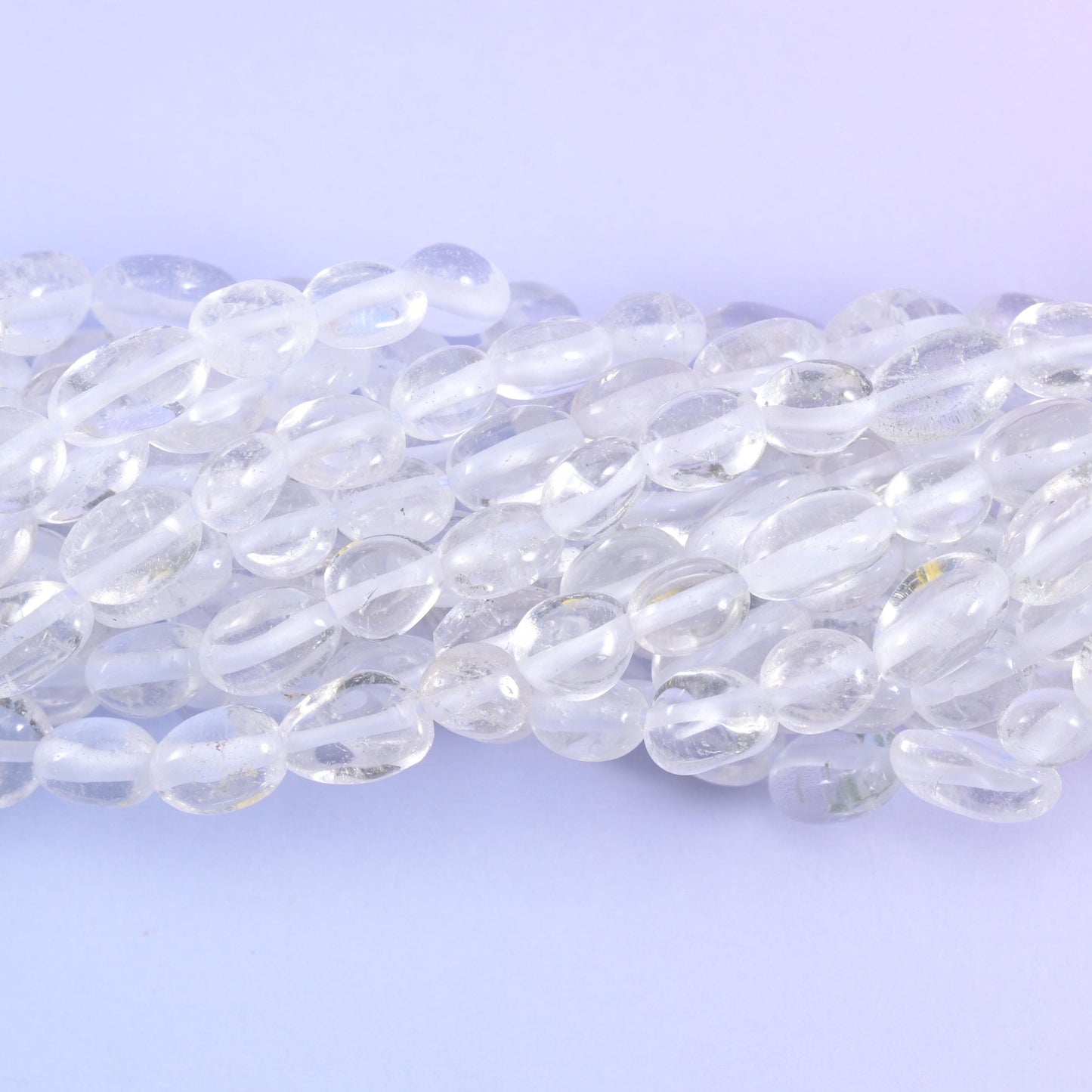 Macro of the nugget faces, glassy quartz marked with frosted internal veiling