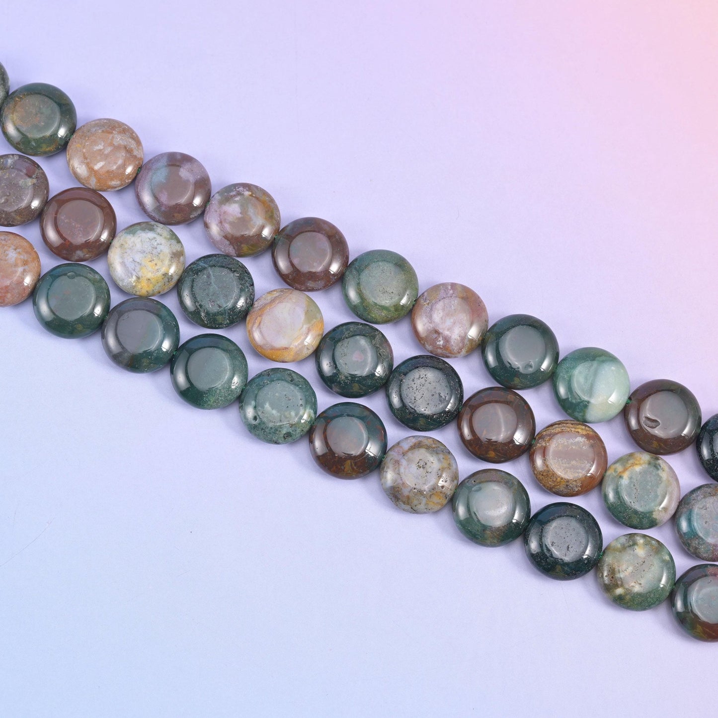 Indian Agate coin beads in forest green, plum brown, dusty rose, and cream tones