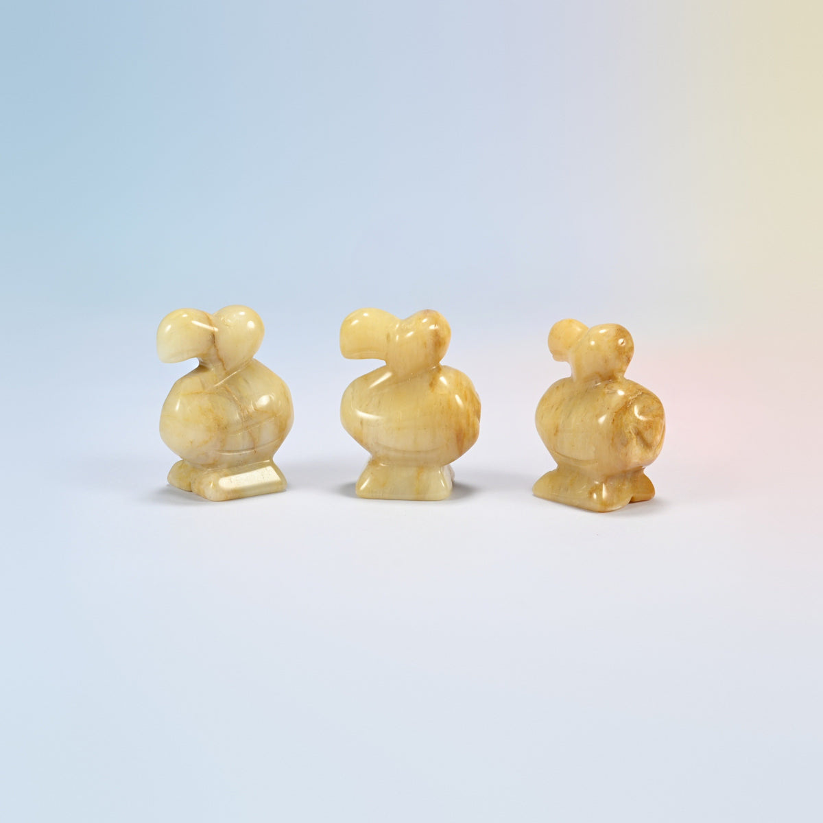 Three yellow jade dodo bird crystal carvings, 1.5 inch, honey yellow natural stone with soft banding