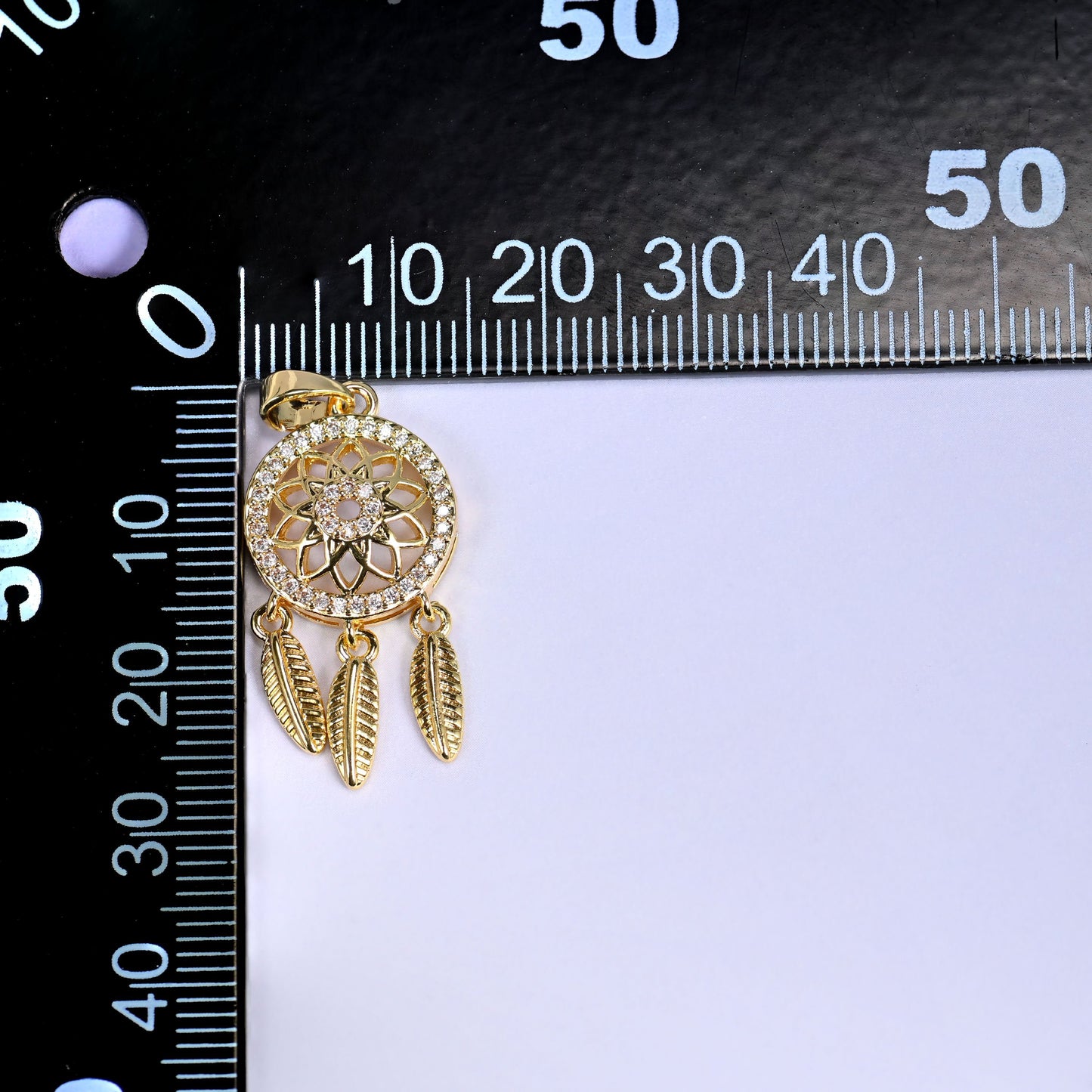 18K Gold Plated Brass Dream Catcher Charm Pendant with an openwork floral medallion, sparkling clear zircon pave, and dangling feather charms
