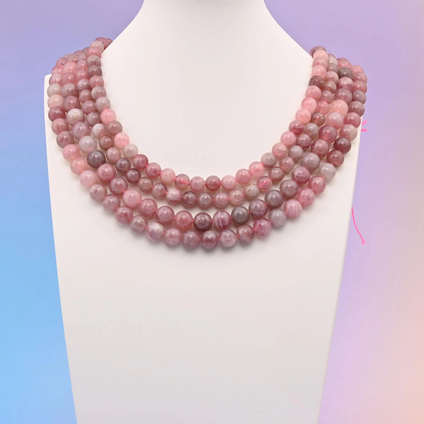 Madagascar Rose Quartz beads, smooth round shape.
