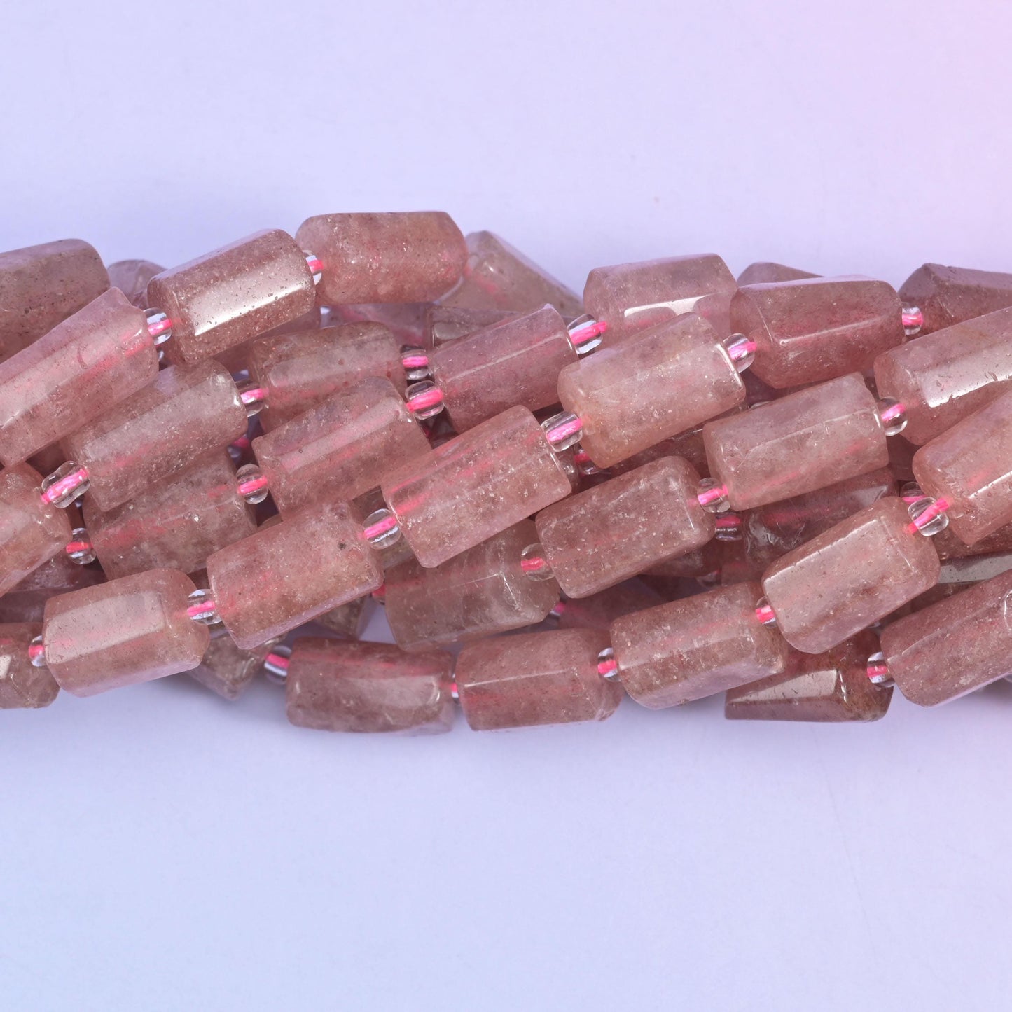 Faceted tube cut Strawberry Quartz beads