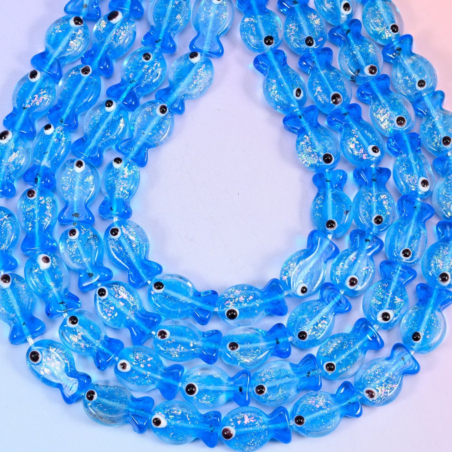 Blue fish glass beads, hole approximately 1.2mm