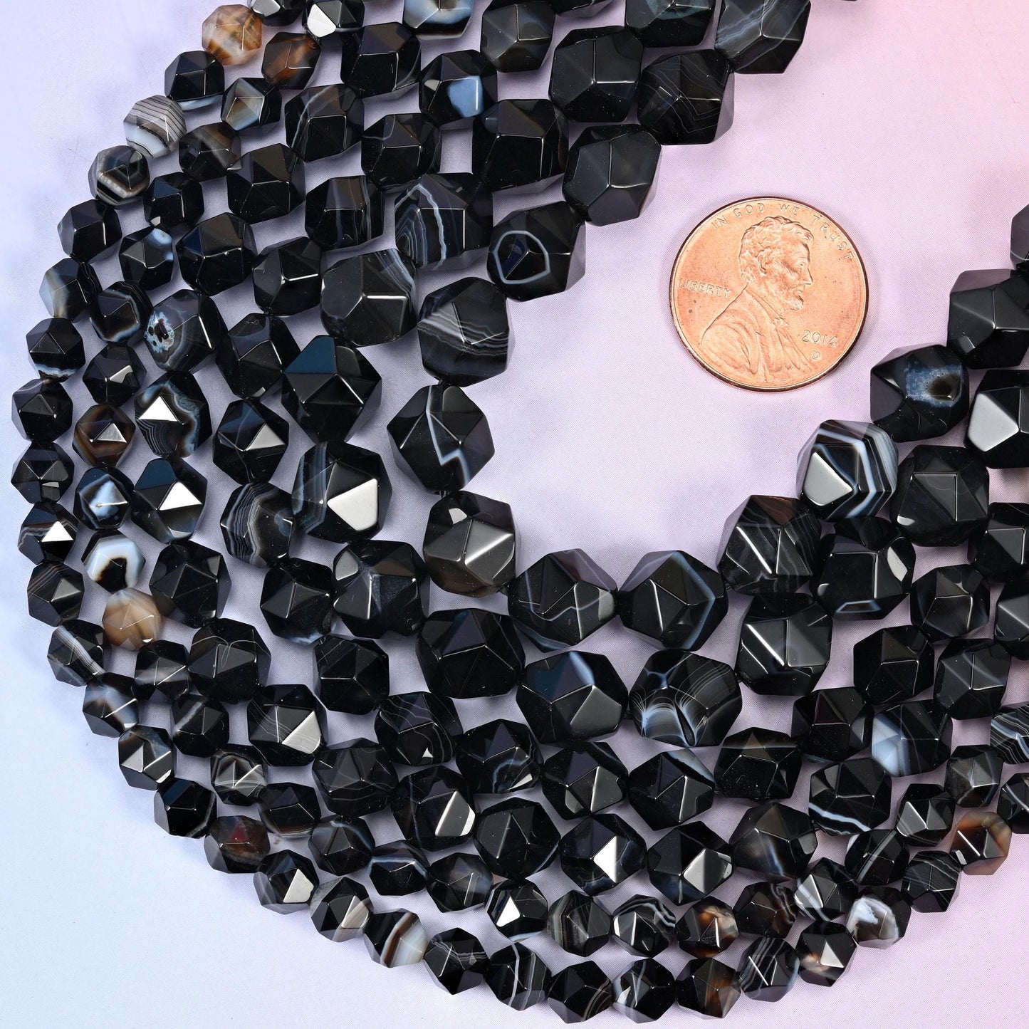 Faceted diamond star cut cut black strip agate beads