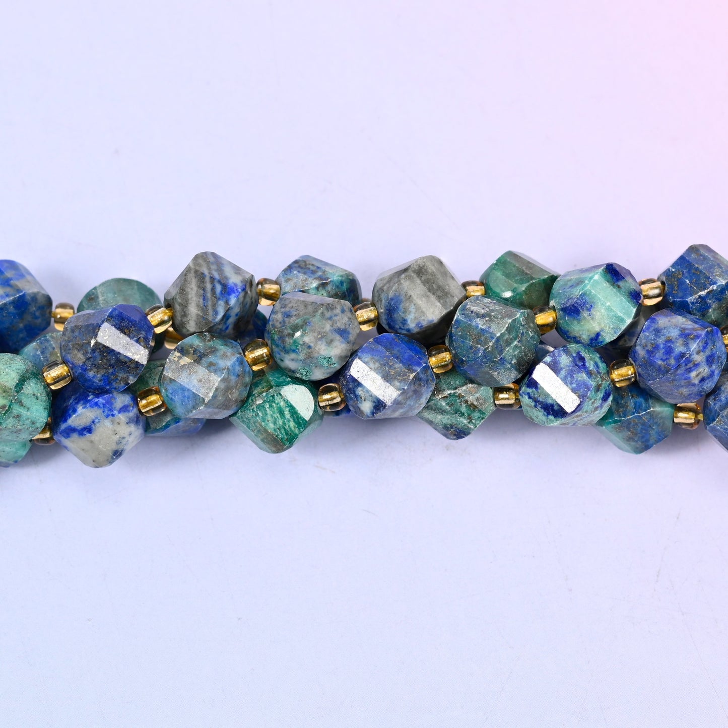 Phoenix Lapis lapis lazuli beads used as spacer or focal beads in handmade jewelry designs, 10mm