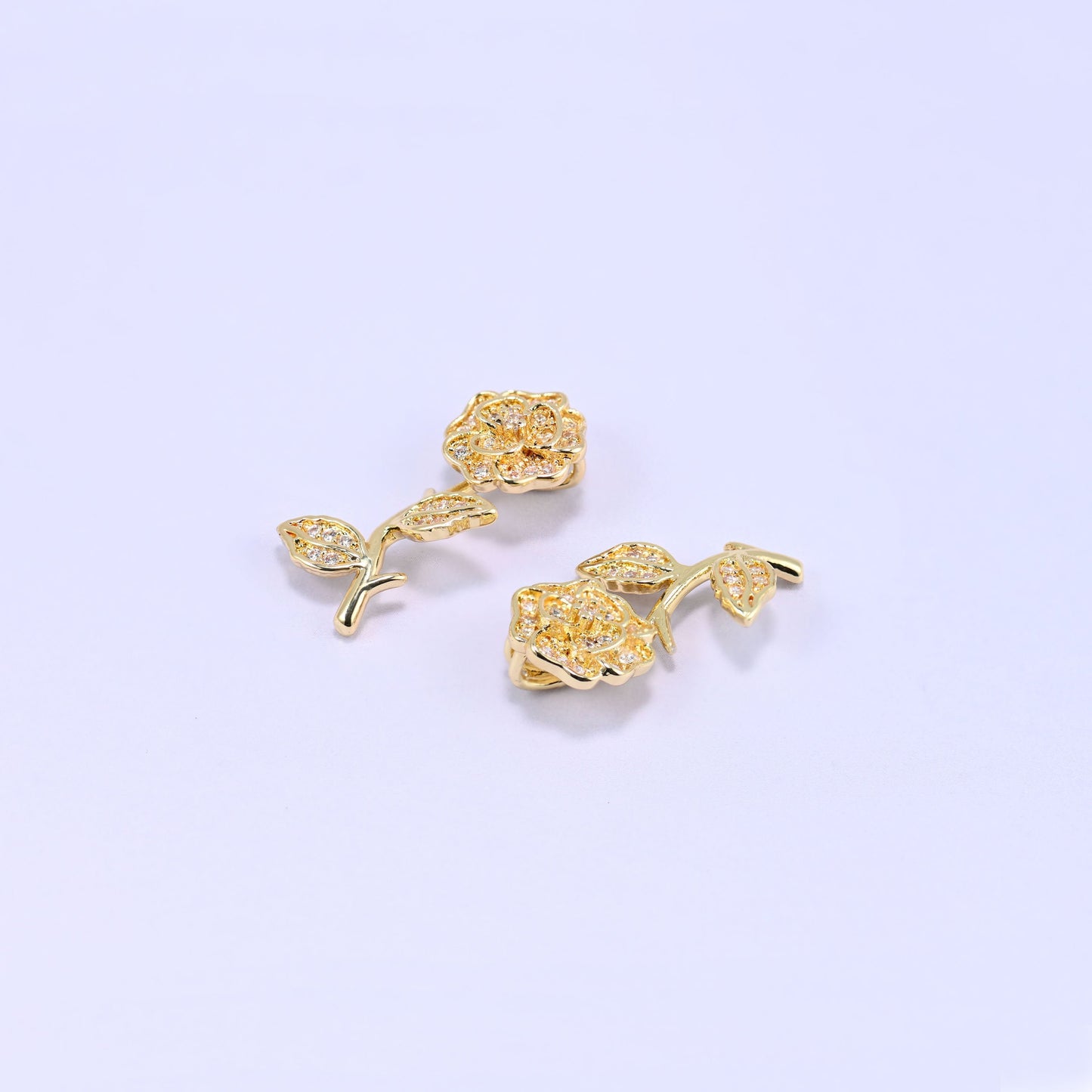 Brass rose and stem charm fully paved in sparkling clear zircon