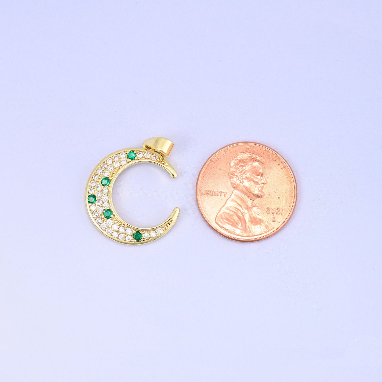 Crescent moon zircon charm pendant with green zircon accents