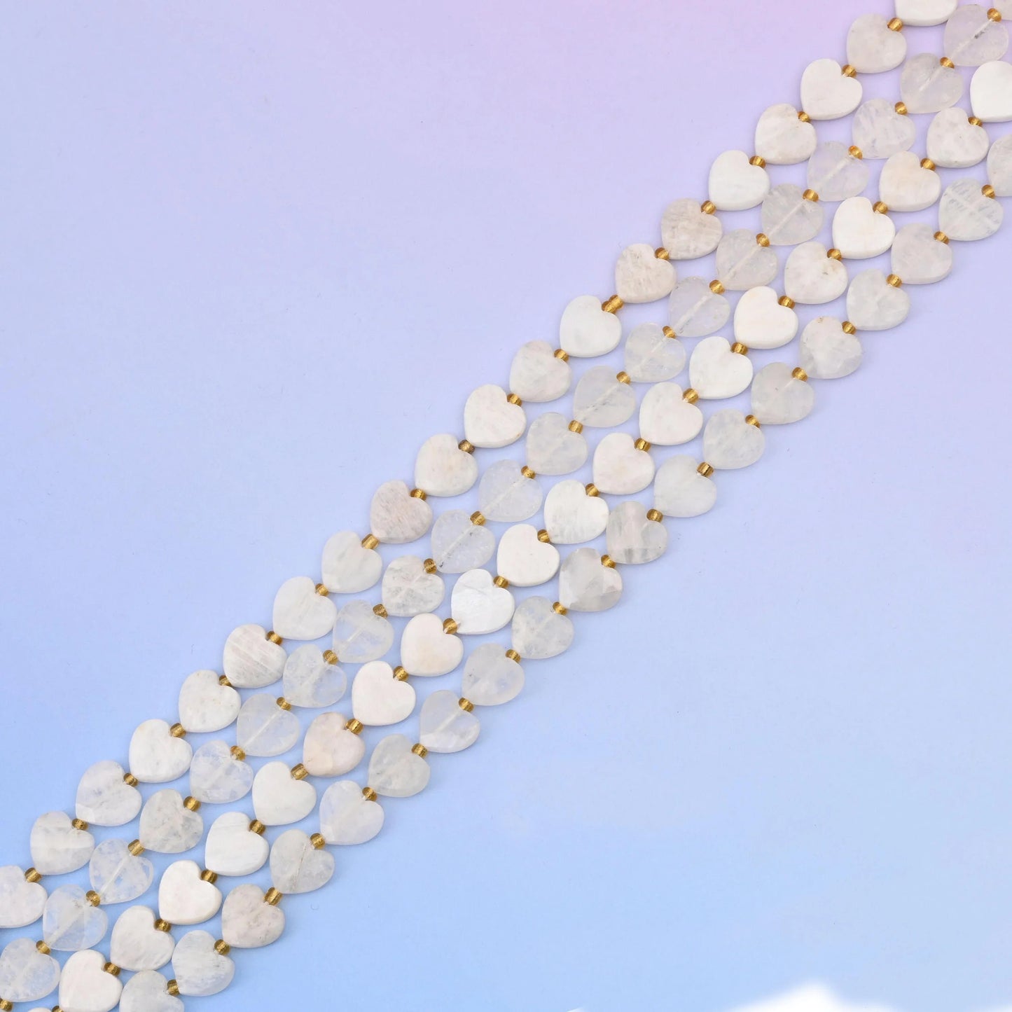 White moonstone beads with a cool blue-grey shimmer