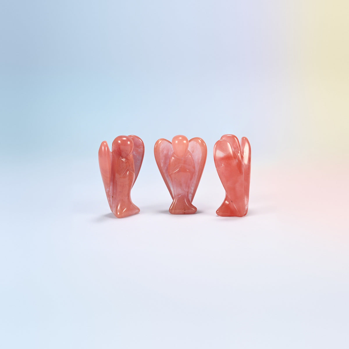 Three melon quartz guardian angel carvings, translucent pink, man-made glass, 2 inch