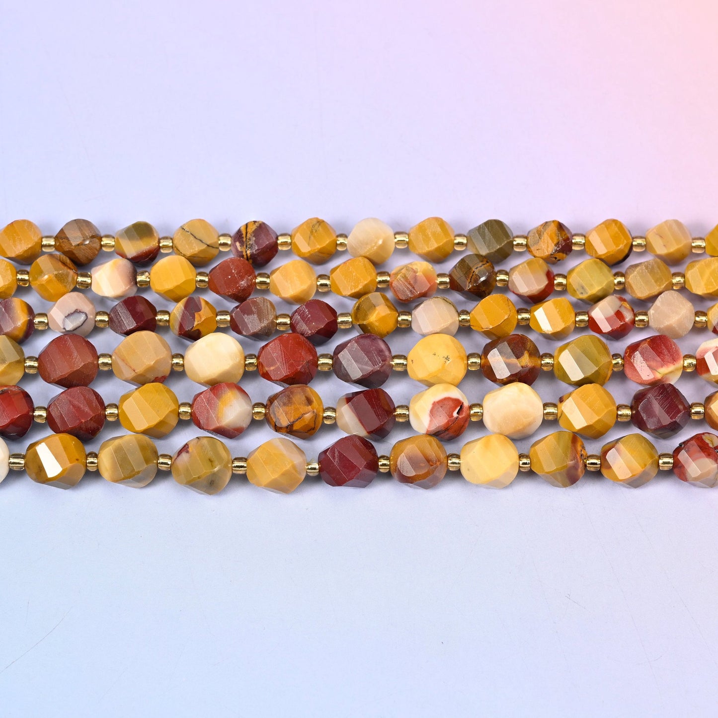 Mookaite in mustard yellow, cream and ochre banded with burgundy and brick red