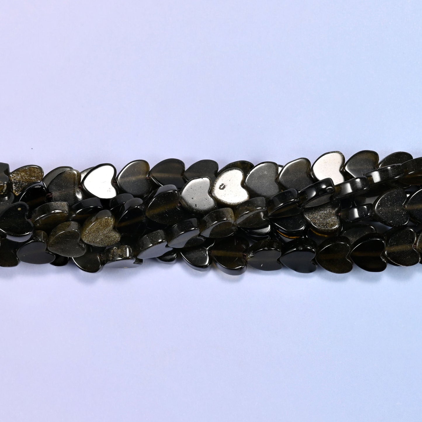 Gold Obsidian Flat Heart Beads, glossy black hearts cut from volcanic glass with a warm olive-bronze sheen
