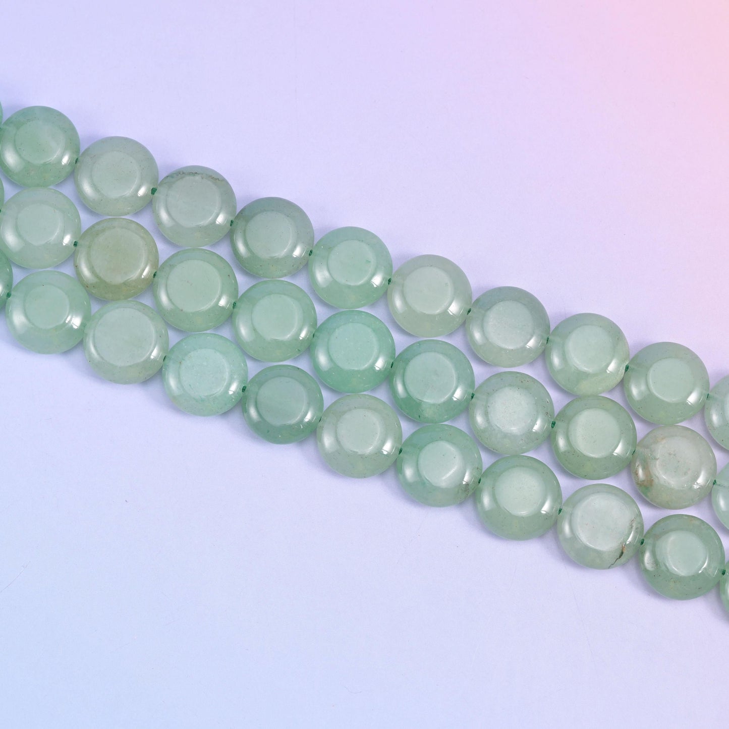 Green Aventurine coin beads ranging from pale celadon to deeper sage