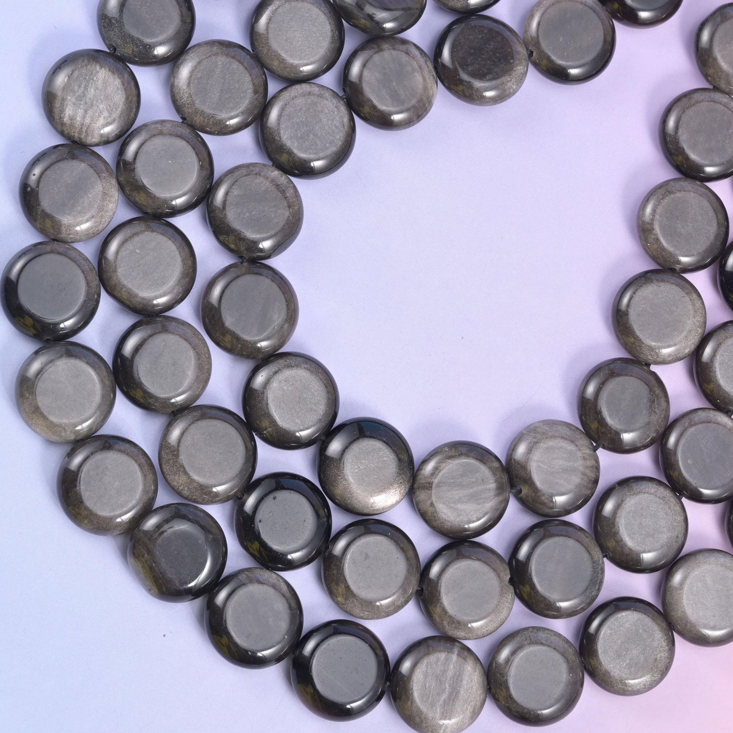 Silver Obsidian coin beads, approximately 26 beads per strand