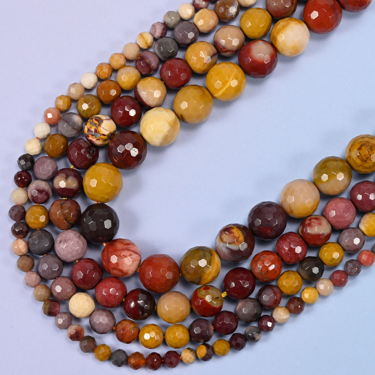 Mookaite Faceted Round Beads, 15 inch strand