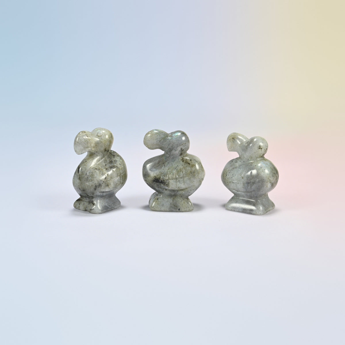 Three white labradorite dodo bird crystal carvings, 1.5 inch, light gray natural stone with dark flecks