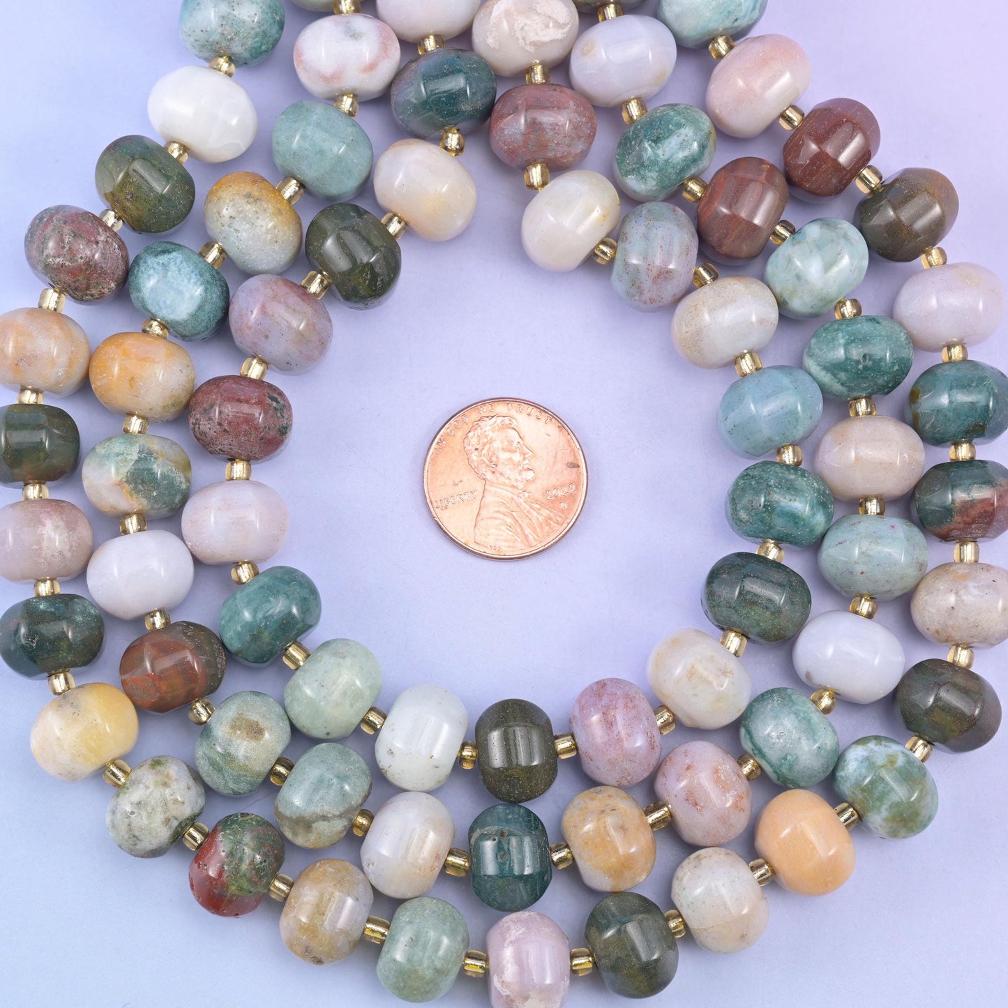 Indian agate smooth pumpkin beads in a rich mix of green, brown, cream and rust tones