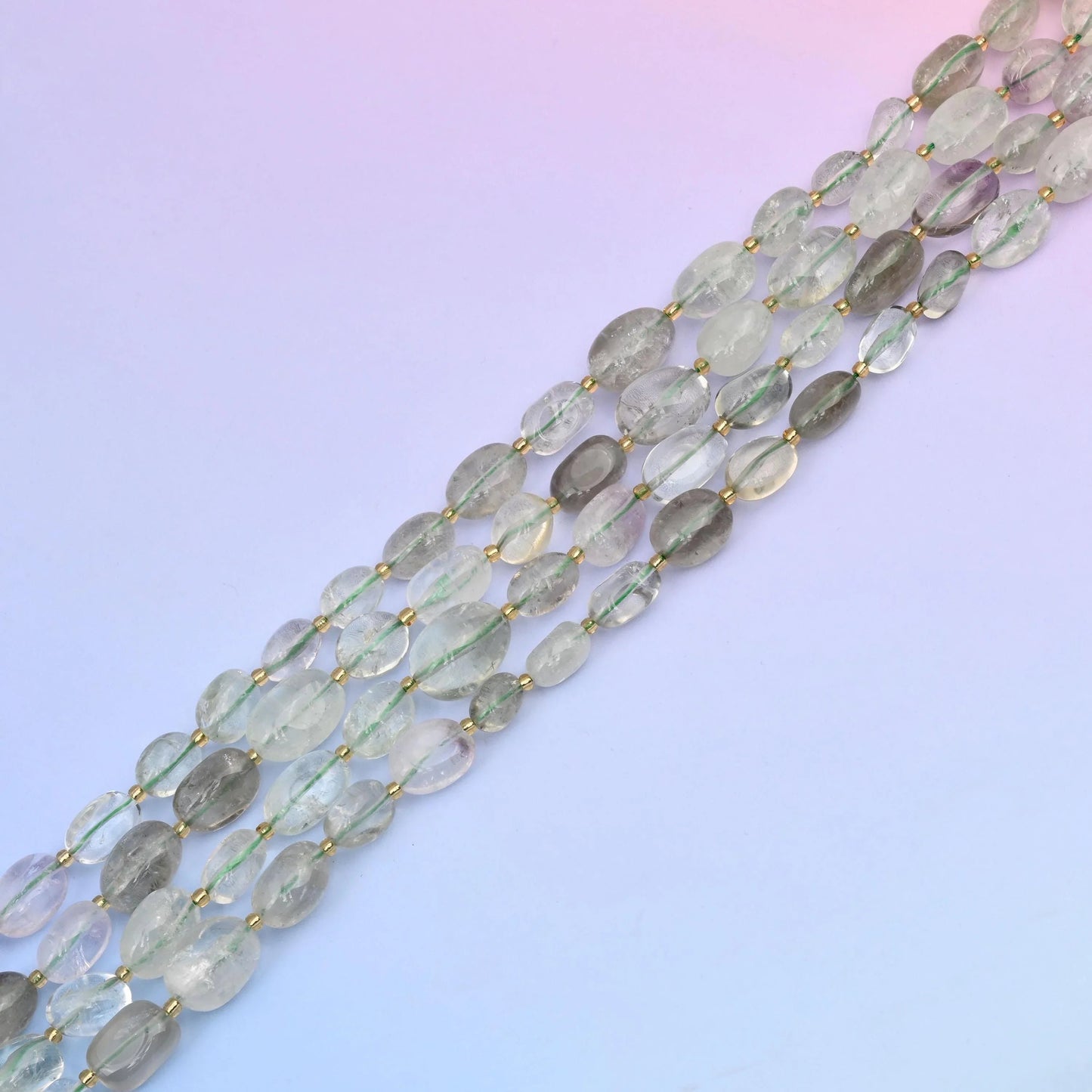 Green amethyst beads in a rich, vibrant green tone