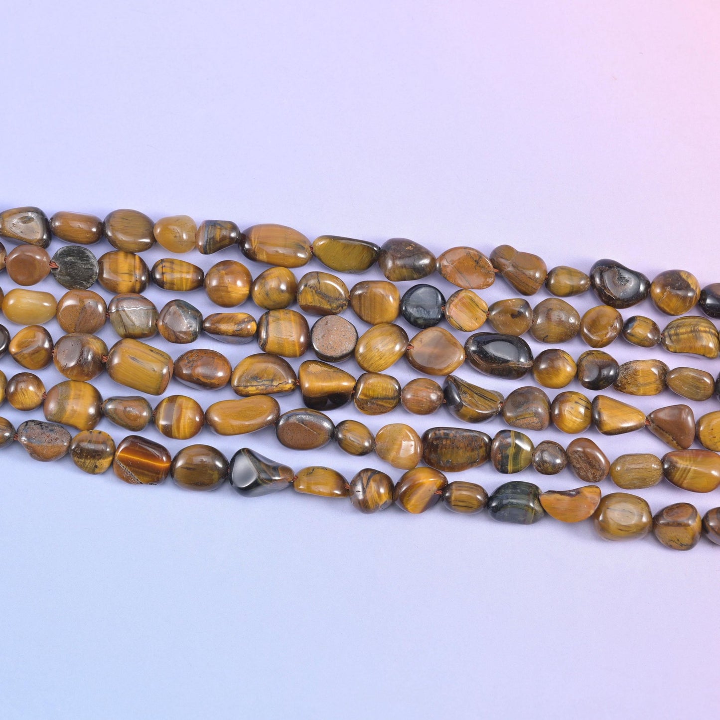Tiger Eye Pebble Nugget Beads in honey gold and dark chocolate banding