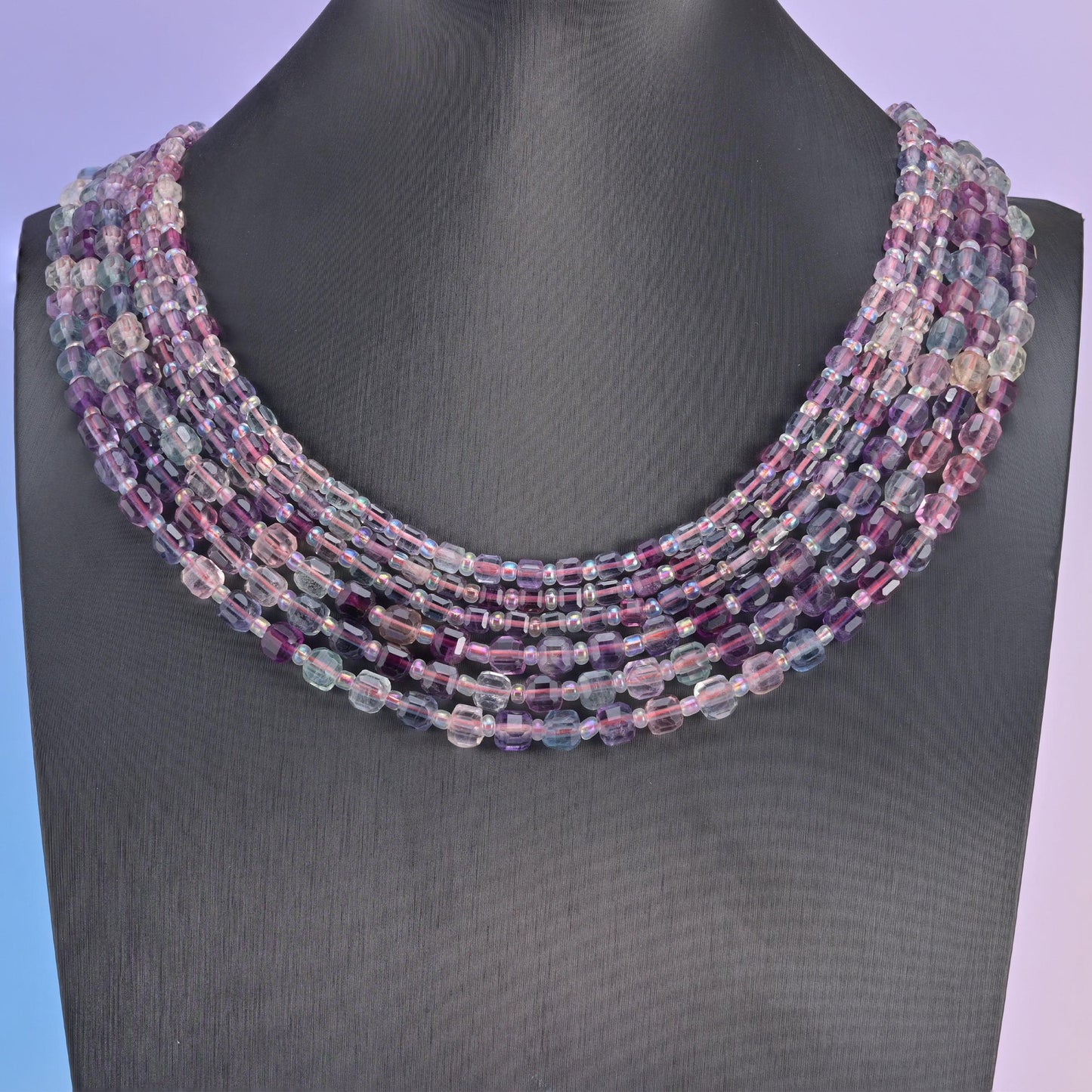Rainbow Fluorite banded in lilac, deep purple and soft mint green.