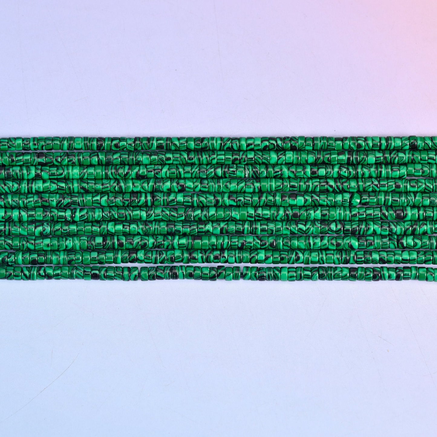 Reconstituted Malachite Smooth Heishi Disc Beads in vivid emerald green