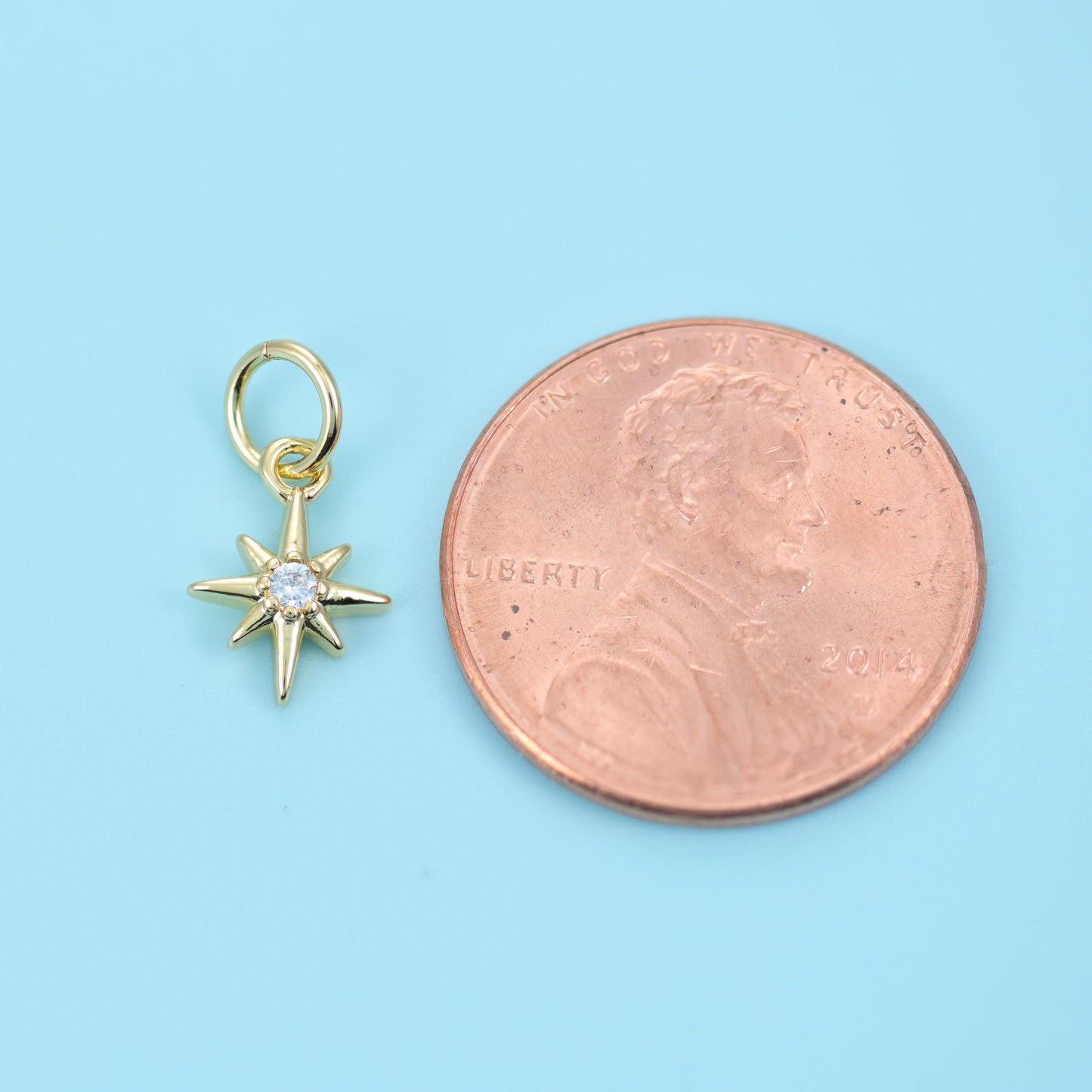 18K Gold Filled North Star Zircon Charm 10x7.24mm in polished gold with a clear zircon centre