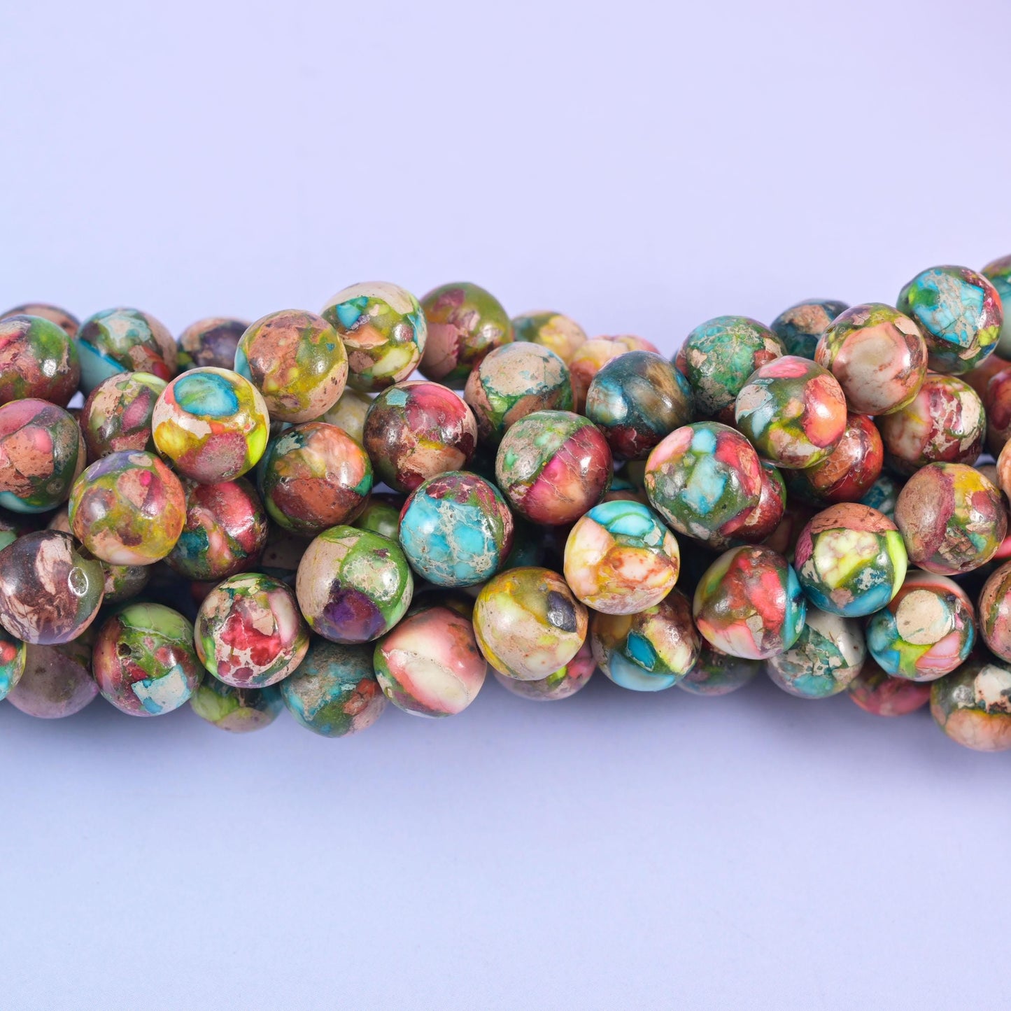 Smooth round cut sea sediment jasper beads (dyed)