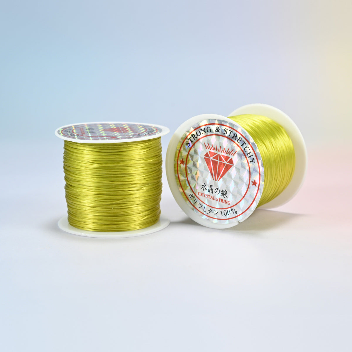 Two rolls of yellow green 0.7-0.8mm elastic stretch string, glossy polyurethane bead cord with a holographic label