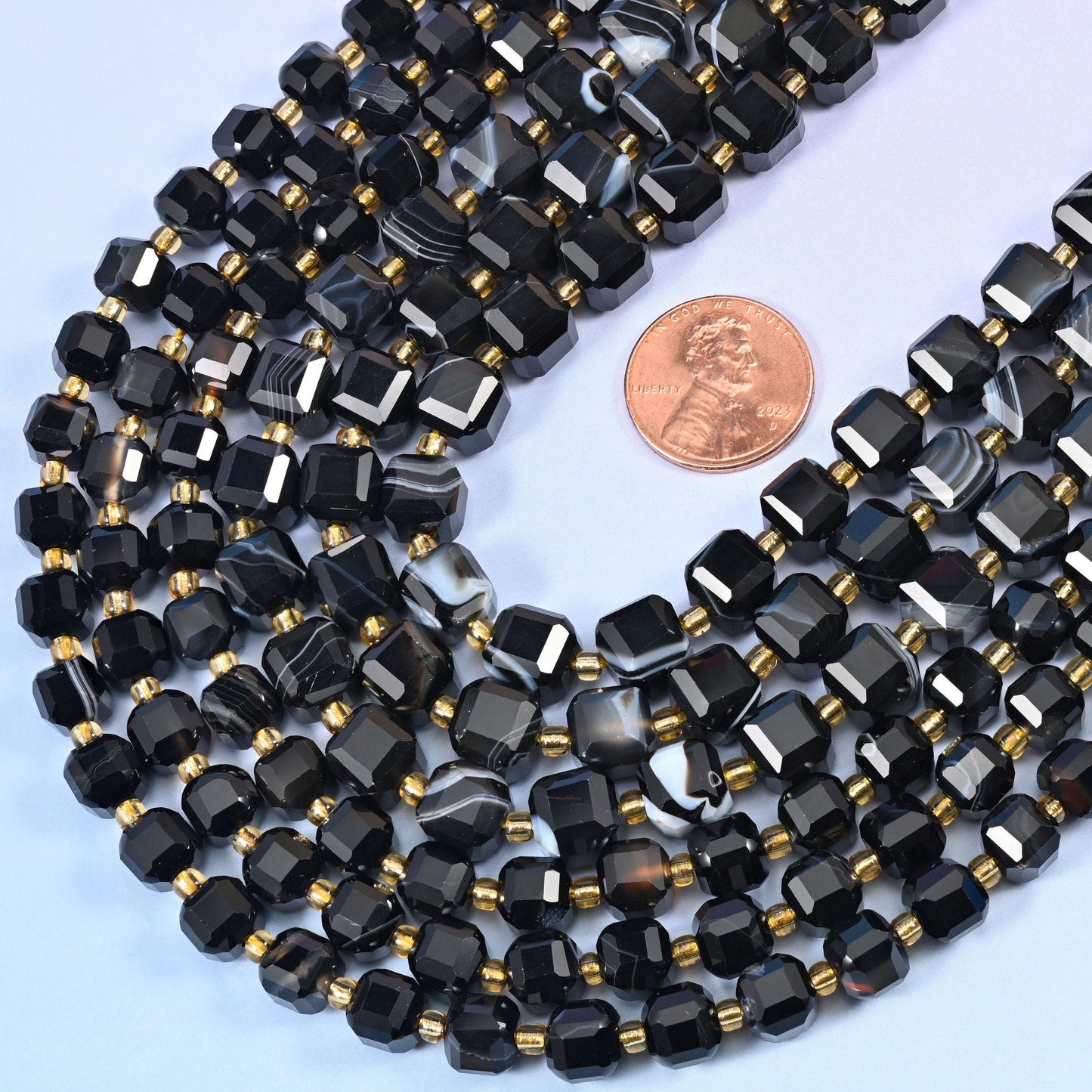 Faceted cube cut dyed black strip agate beads