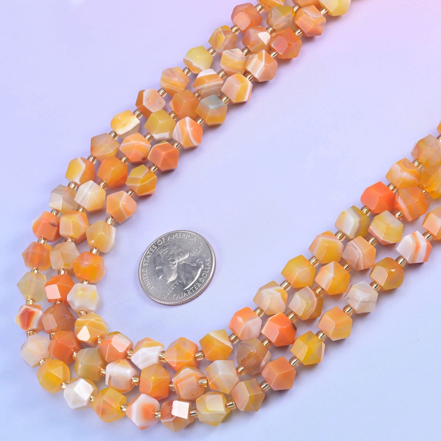 Eight flat sides cut into a sharp rhombus, so every bead throws light from a different angle instead of one soft highlight.…
