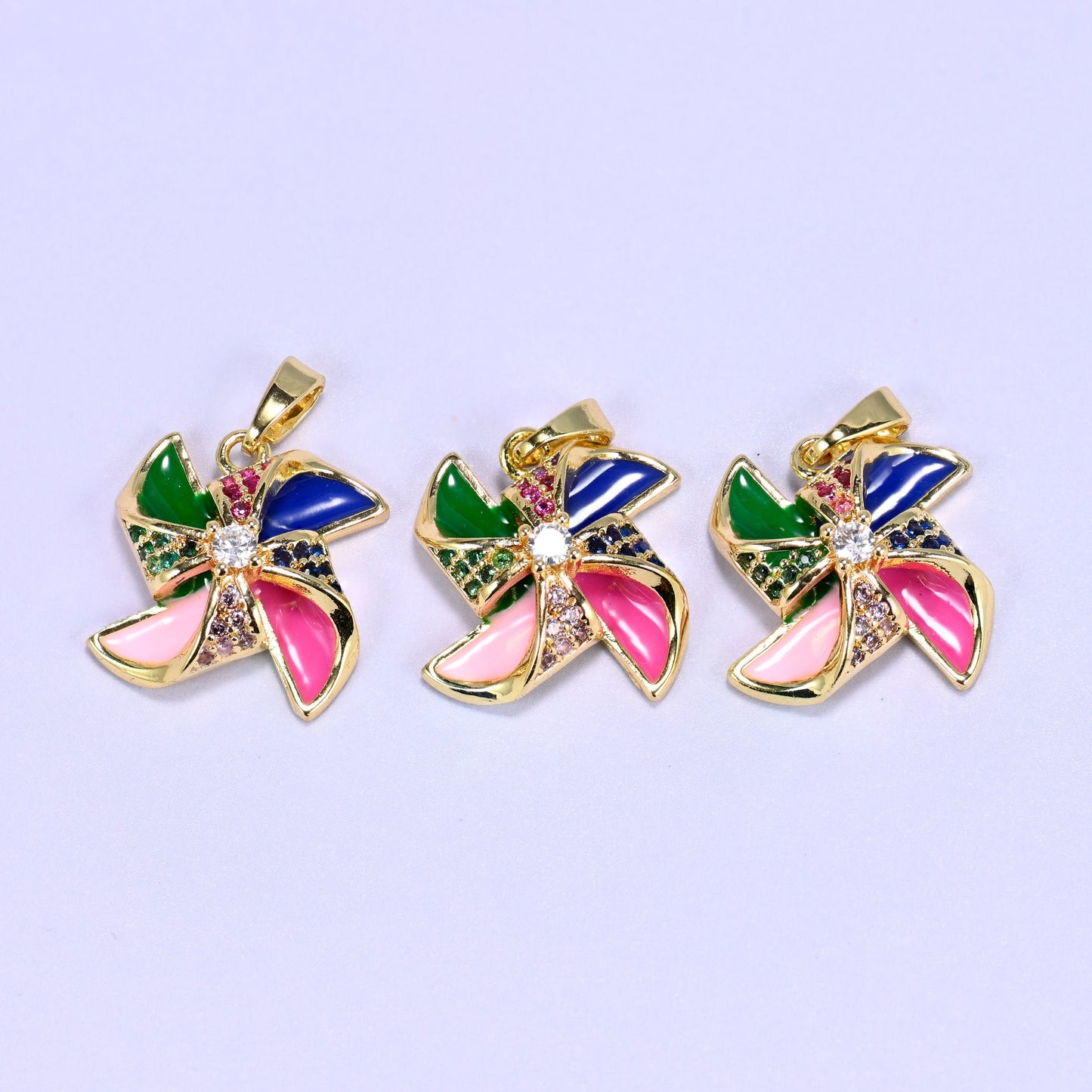 Colorful Windmill Zircon Charms with multicolor zircon accents along the spokes