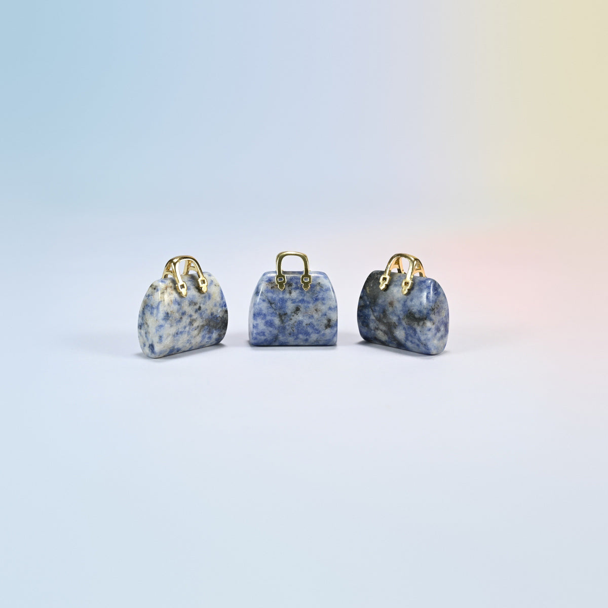 Three blue spot jasper purse crystal carvings, 1 inch, white natural stone with blue spots, gold-tone handle