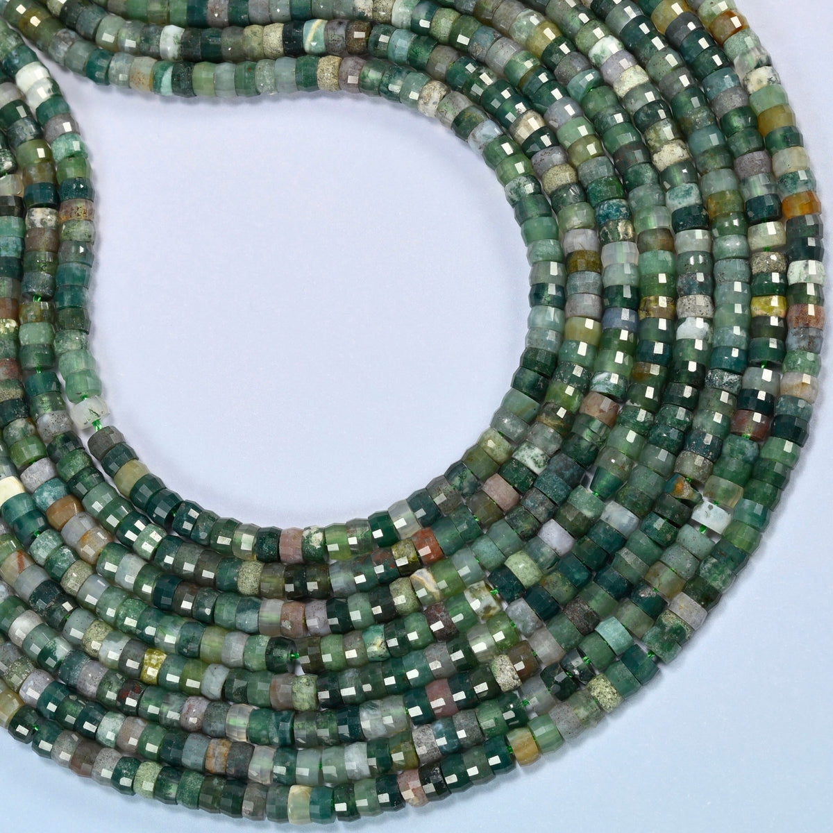 Indian agate faceted heishi disc beads curved into an open loop, forest green and gray-green beads