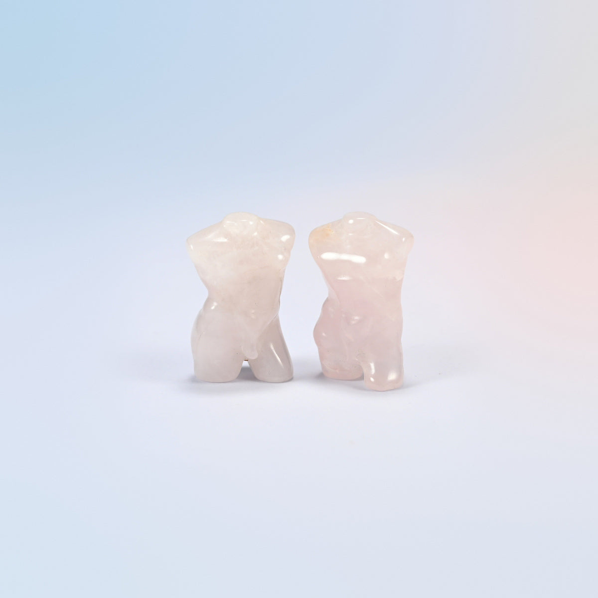 Two natural rose quartz male goddess torso carvings, 1.3 inch, light pink