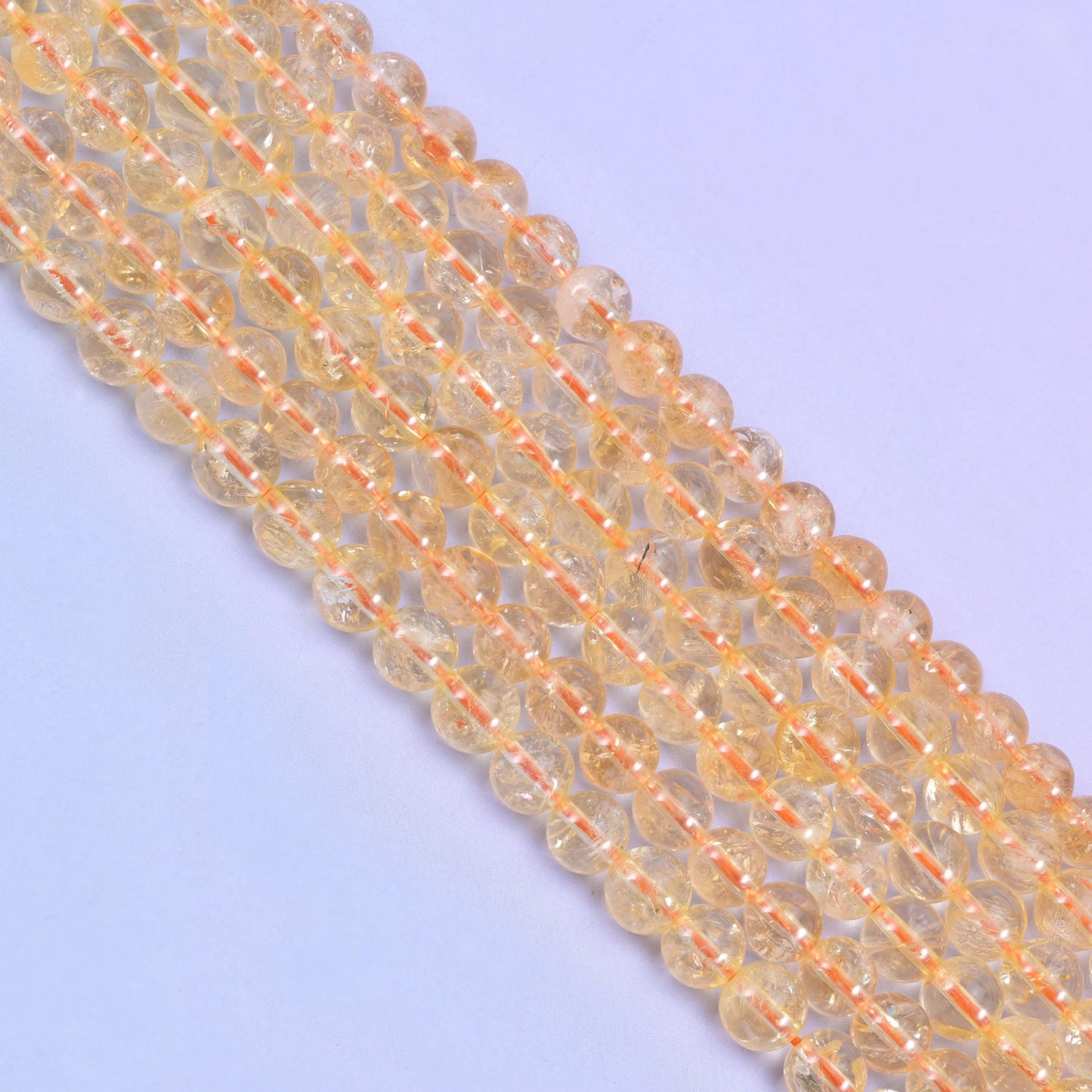 Smooth round cut citrine beads