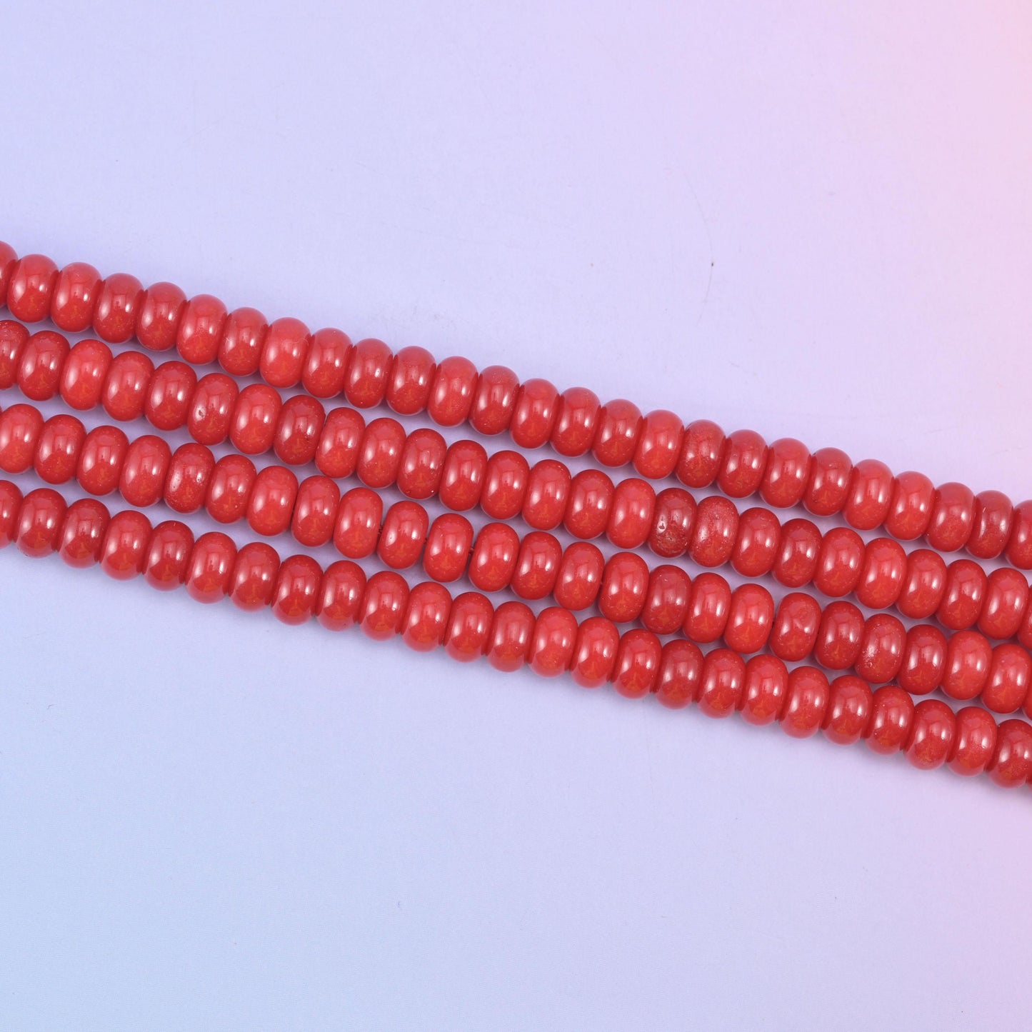 Red Dyed Jade beads in a bold, glossy cherry red tone