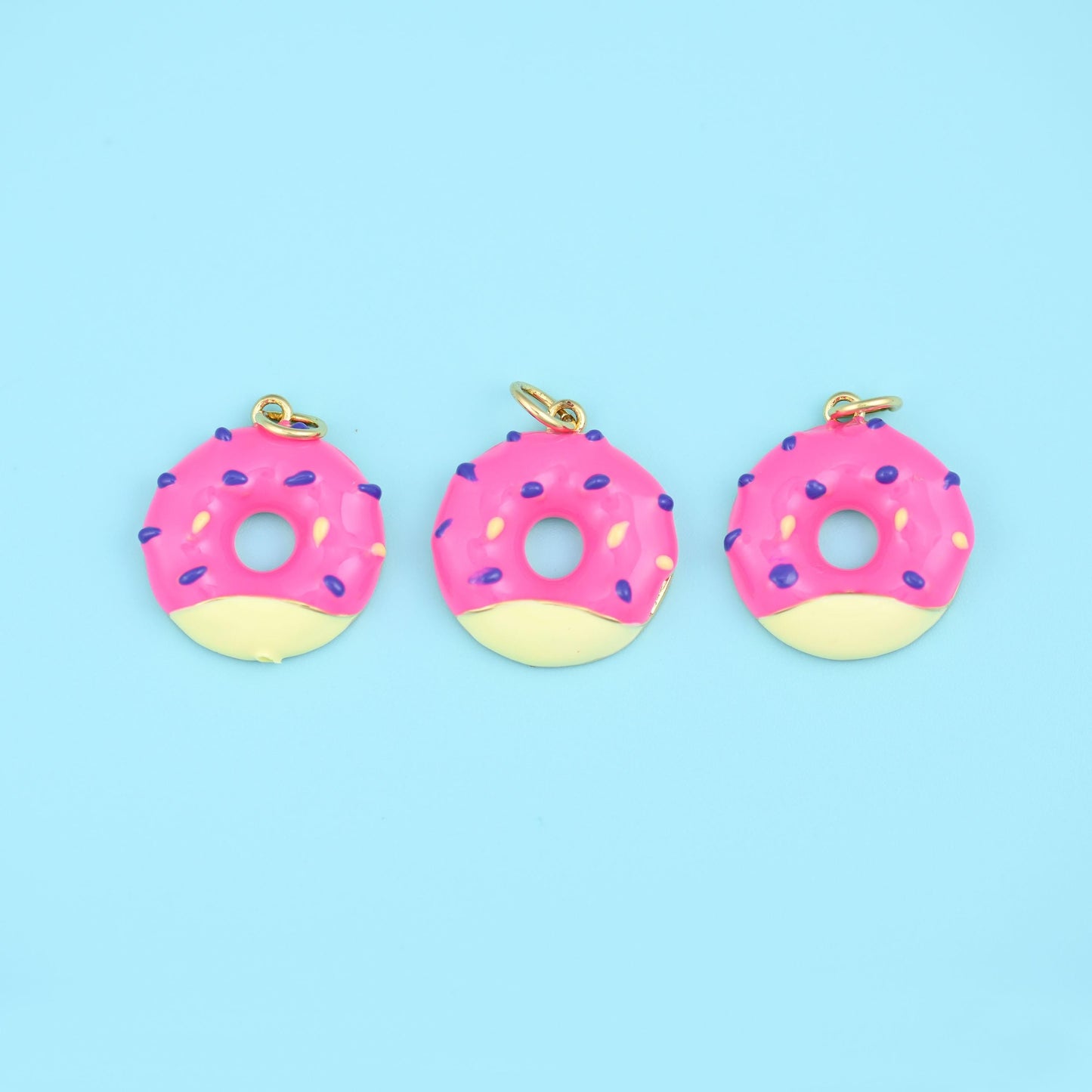 Sprinkle Donut Charm 17.97x16.25mm, lower half glazed in sky blue, bubblegum pink or vanilla cream