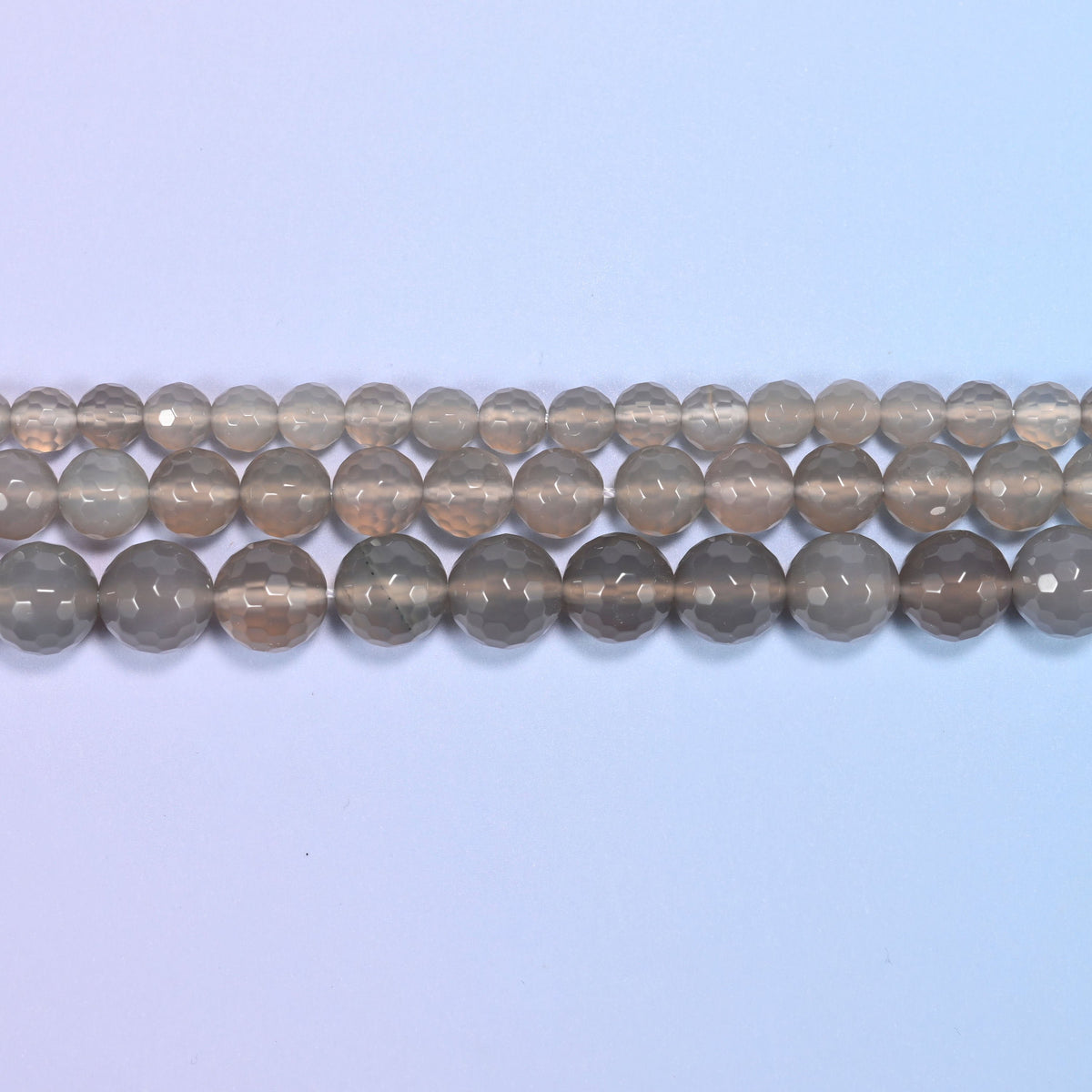 Gray agate beads in smoky translucent grey with paler milky banding