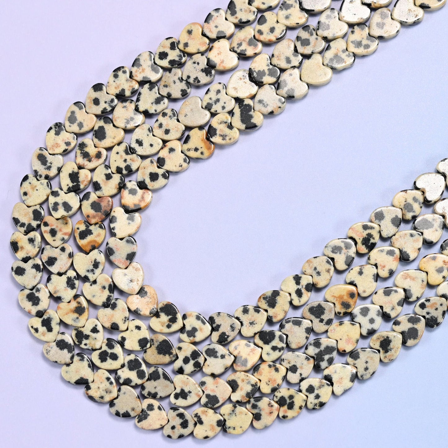 Dalmatian Jasper Flat Heart Beads in cream with black spots