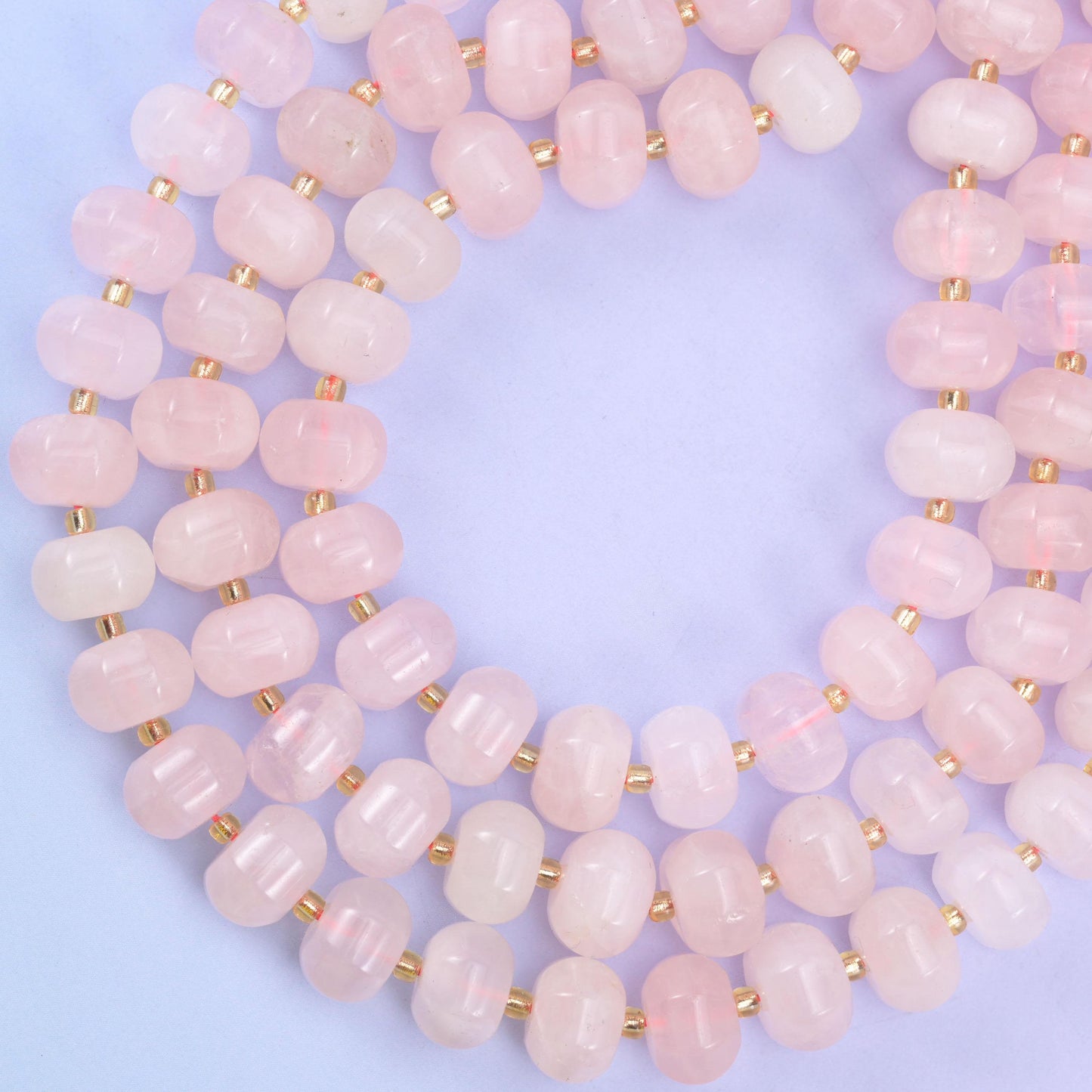 Rose Quartz smooth pumpkin beads in soft, translucent blush pink