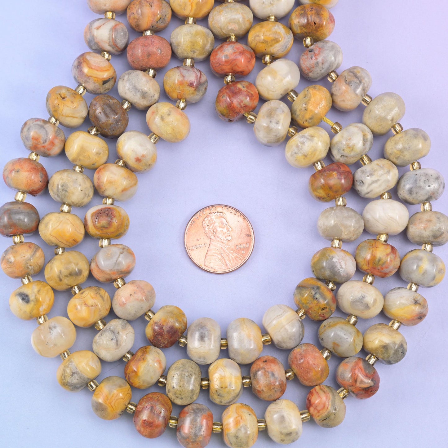 Crazy agate smooth pumpkin beads in warm cream, tan and terracotta swirls