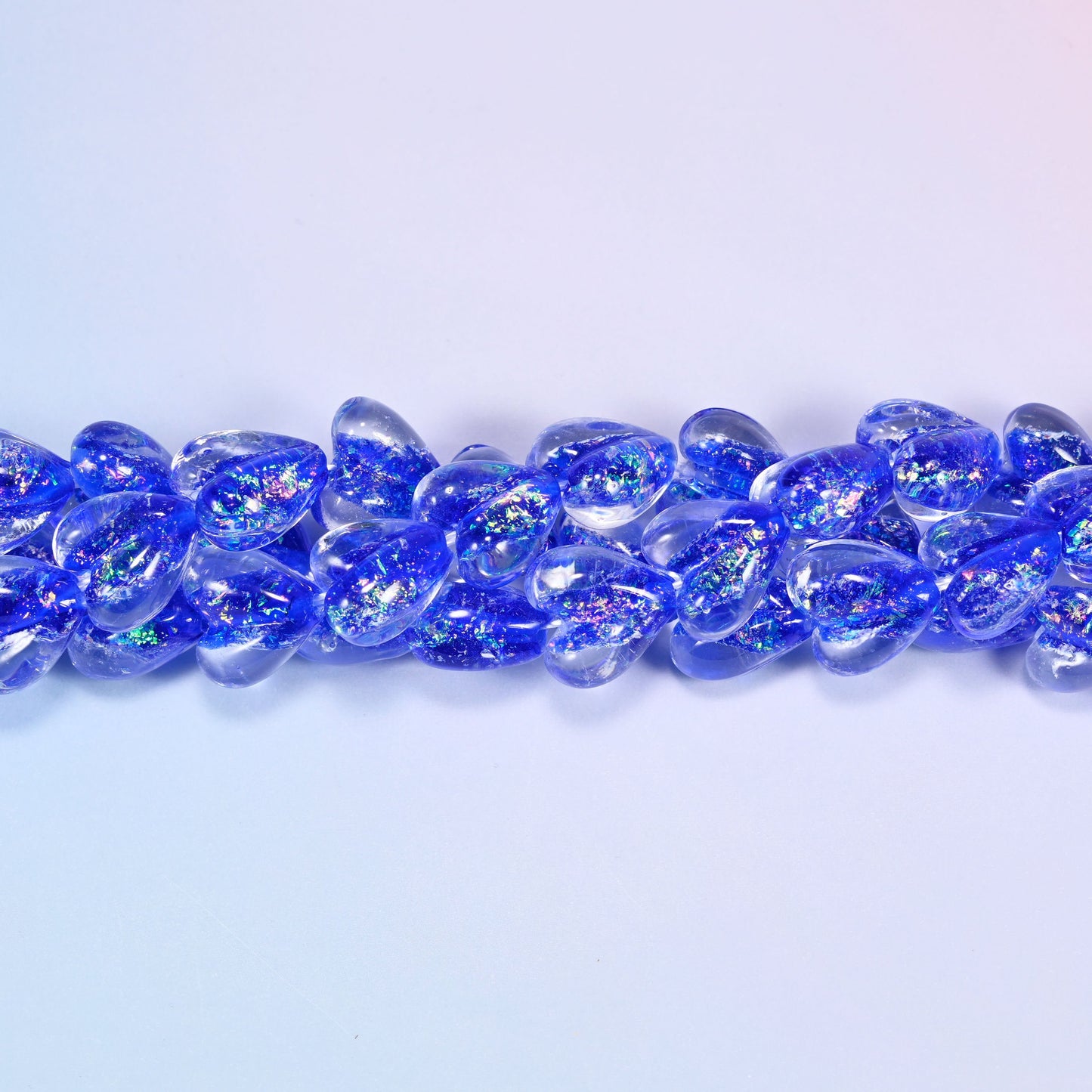 Iridescent Dark Blue Heart Glass Beads, 24 beads per strand