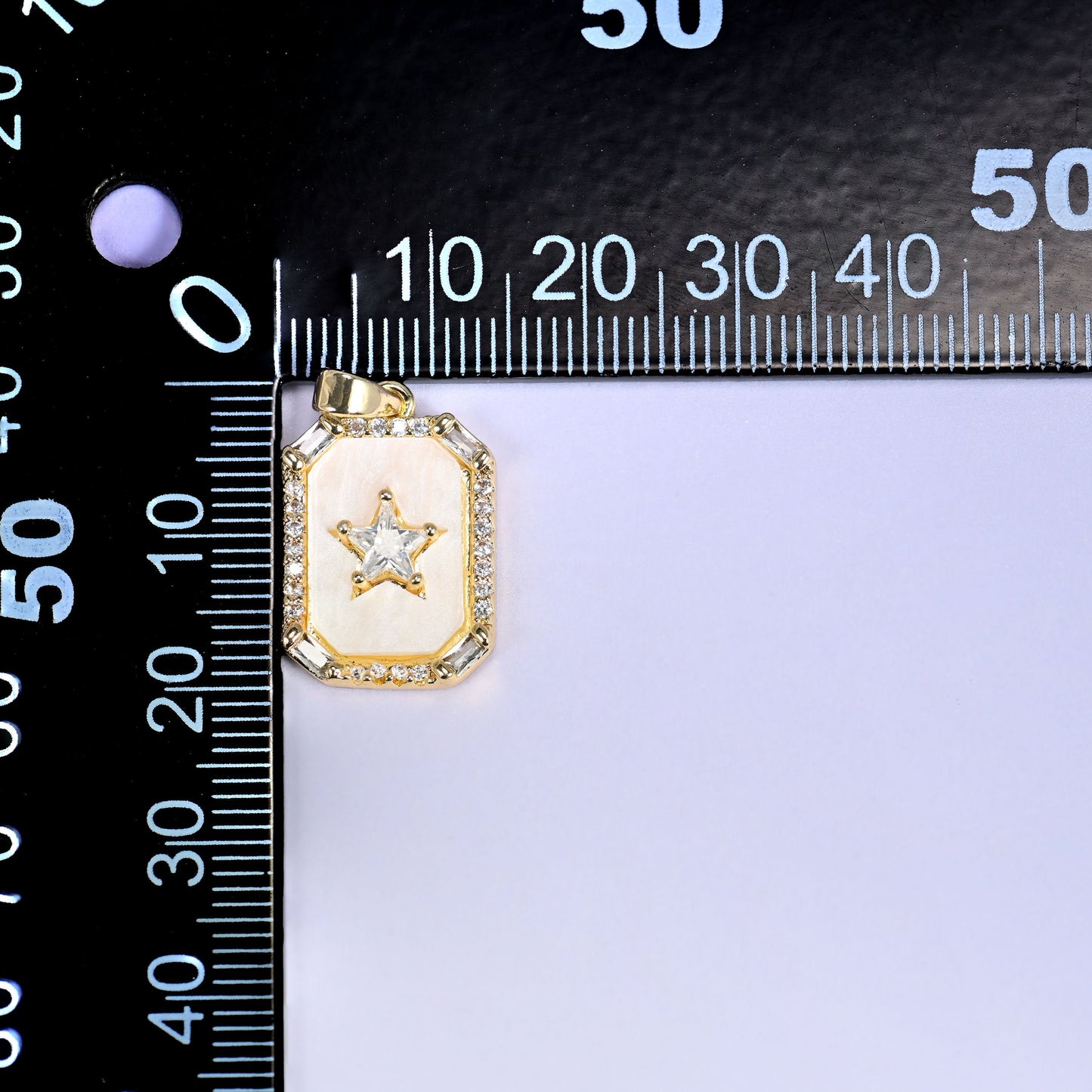 18K Gold Plated Brass Star Frame Charm Pendant with a white shell center, a sparkling clear zircon star, and a baguette and round zircon border